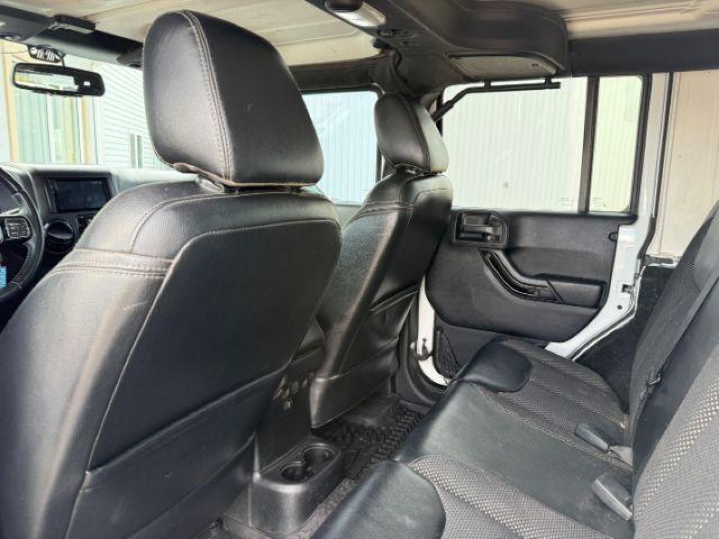 2016 WHITE /Black Jeep Wrangler Unlimited (1C4BJWEG5GL) with an Pentastar 36L V-6 DOHC engine, Automatic transmission, located at 1175 N Woodruff Ave, Idaho Falls, ID, 83401, 43.506901, -111.999657 - At Timberline Auto, finding a great deal on your next vehicle is always easy! Our experienced sales staff's goal is to help find you the right vehicle at the right price! Our knowledgeable finance department has options for almost any credit score. We offer extended service contract options to prote - Photo#43