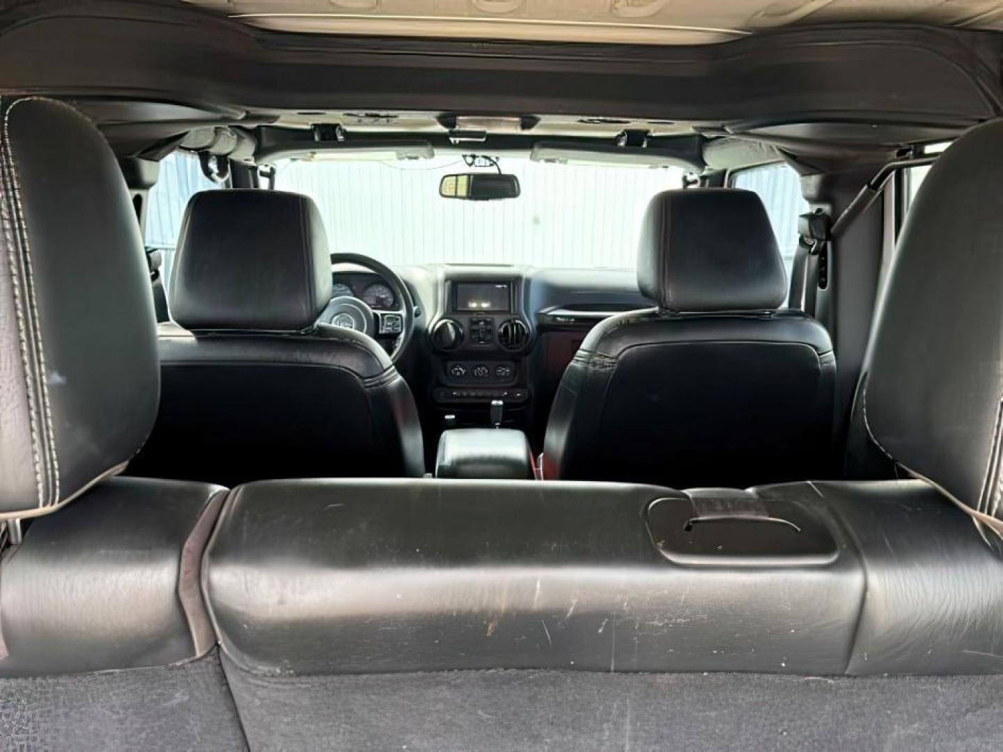 2016 WHITE /Black Jeep Wrangler Unlimited (1C4BJWEG5GL) with an Pentastar 36L V-6 DOHC engine, Automatic transmission, located at 1175 N Woodruff Ave, Idaho Falls, ID, 83401, 43.506901, -111.999657 - At Timberline Auto, finding a great deal on your next vehicle is always easy! Our experienced sales staff's goal is to help find you the right vehicle at the right price! Our knowledgeable finance department has options for almost any credit score. We offer extended service contract options to prote - Photo#5