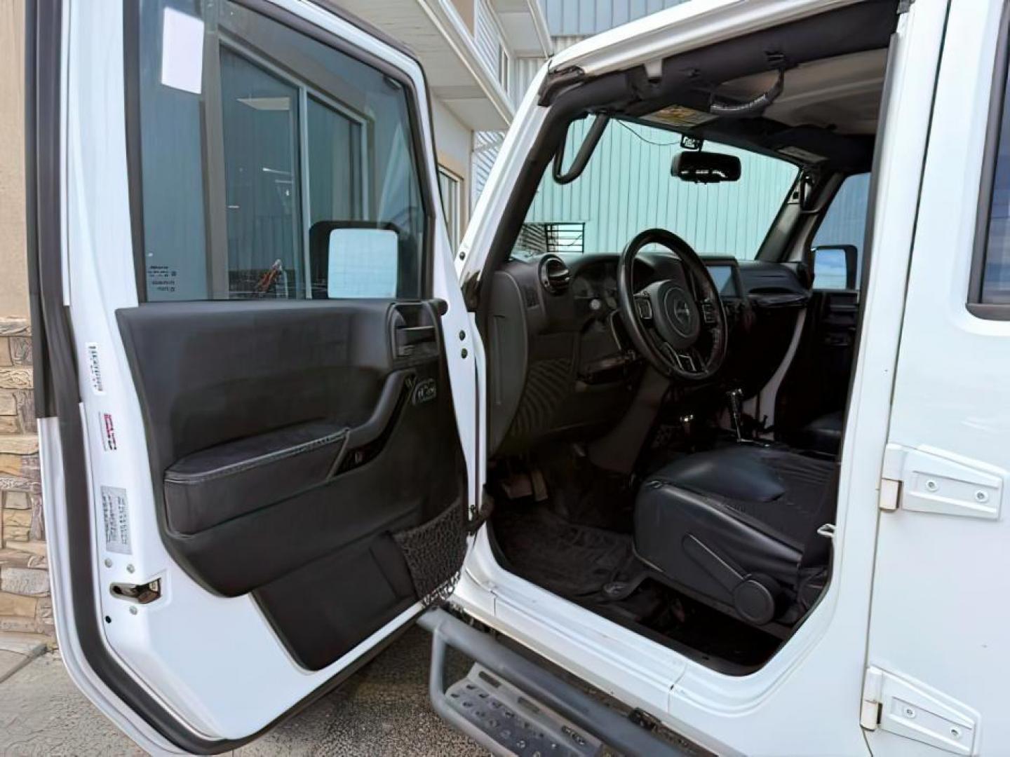 2016 WHITE /Black Jeep Wrangler Unlimited (1C4BJWEG5GL) with an Pentastar 36L V-6 DOHC engine, Automatic transmission, located at 1175 N Woodruff Ave, Idaho Falls, ID, 83401, 43.506901, -111.999657 - At Timberline Auto, finding a great deal on your next vehicle is always easy! Our experienced sales staff's goal is to help find you the right vehicle at the right price! Our knowledgeable finance department has options for almost any credit score. We offer extended service contract options to prote - Photo#12