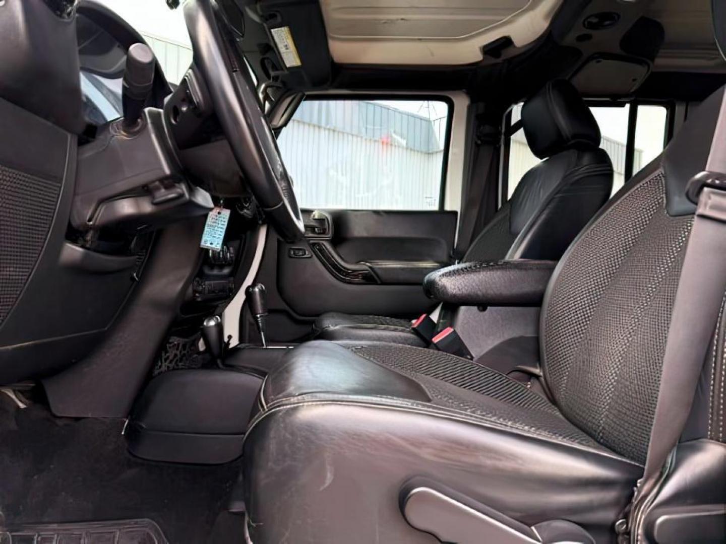 2016 WHITE /Black Jeep Wrangler Unlimited (1C4BJWEG5GL) with an Pentastar 36L V-6 DOHC engine, Automatic transmission, located at 1175 N Woodruff Ave, Idaho Falls, ID, 83401, 43.506901, -111.999657 - At Timberline Auto, finding a great deal on your next vehicle is always easy! Our experienced sales staff's goal is to help find you the right vehicle at the right price! Our knowledgeable finance department has options for almost any credit score. We offer extended service contract options to prote - Photo#13