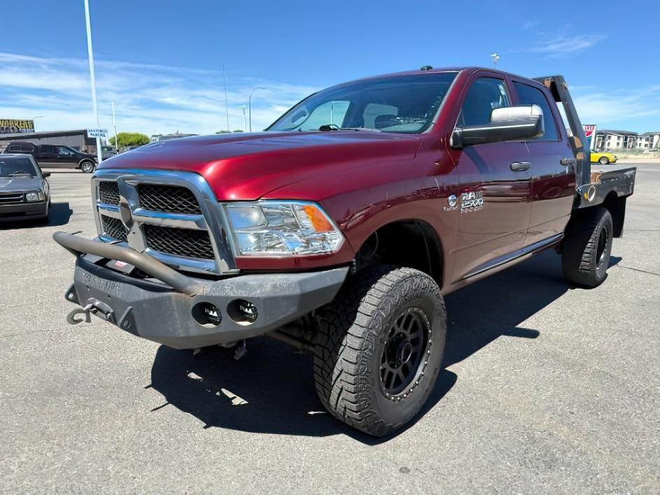 2017 MAROON /Diesel Gray/Black Ram 2500 Tradesman Crew Cab 4x4 6'4 Box (3C6UR5CL6HG) with an Cummins 6.7L I-6 diesel direct injection engine, AUTOMATIC transmission, located at 1235 N Woodruff Ave., Idaho Falls, 83401, (208) 523-1053, 43.507172, -112.000488 - At Timberline Auto, finding a great deal on your next vehicle is always easy! Our experienced sales staff's goal is to help find you the right vehicle at the right price! Our knowledgeable finance department has options for almost any credit score. We offer extended service contract options to prote - Photo#0