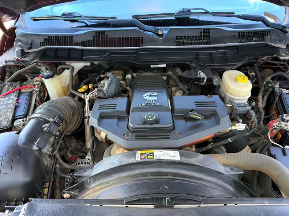 2017 MAROON /Diesel Gray/Black Ram 2500 Tradesman Crew Cab 4x4 6'4 Box (3C6UR5CL6HG) with an Cummins 6.7L I-6 diesel direct injection engine, AUTOMATIC transmission, located at 1235 N Woodruff Ave., Idaho Falls, 83401, (208) 523-1053, 43.507172, -112.000488 - At Timberline Auto, finding a great deal on your next vehicle is always easy! Our experienced sales staff's goal is to help find you the right vehicle at the right price! Our knowledgeable finance department has options for almost any credit score. We offer extended service contract options to prote - Photo#24