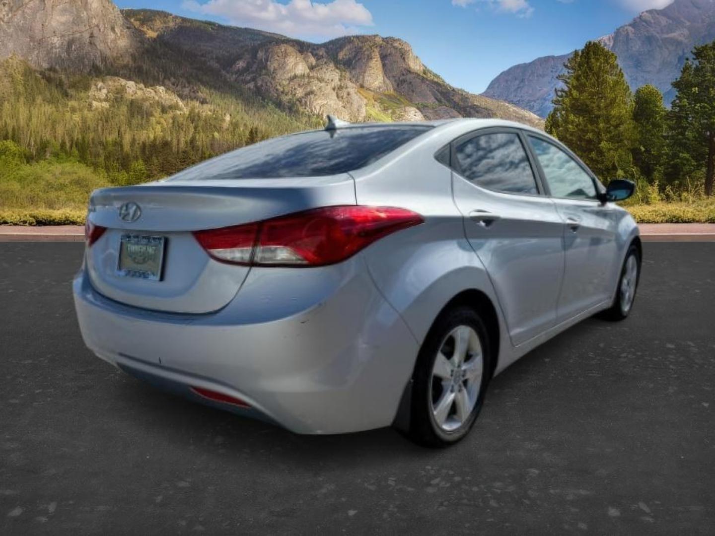 2012 SILVER /Gray Cloth Interior Hyundai Elantra (5NPDH4AE4CH) with an 18L L4 DOHC 16V engine, Automatic transmission, located at 1175 N Woodruff Ave, Idaho Falls, ID, 83401, 43.506901, -111.999657 - At Timberline Auto, finding a great deal on your next vehicle is always easy! Our experienced sales staff's goal is to help find you the right vehicle at the right price! Our knowledgeable finance department has options for almost any credit score. We offer extended service contract options to prote - Photo#4