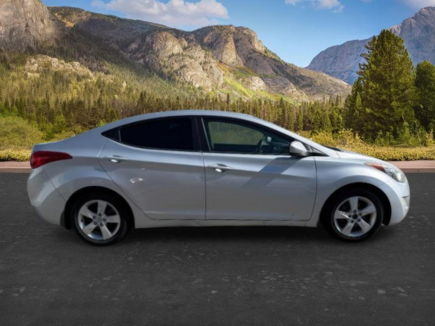2012 SILVER /Gray Cloth Interior Hyundai Elantra (5NPDH4AE4CH) with an 18L L4 DOHC 16V engine, Automatic transmission, located at 1175 N Woodruff Ave, Idaho Falls, ID, 83401, 43.506901, -111.999657 - At Timberline Auto, finding a great deal on your next vehicle is always easy! Our experienced sales staff's goal is to help find you the right vehicle at the right price! Our knowledgeable finance department has options for almost any credit score. We offer extended service contract options to prote - Photo#5