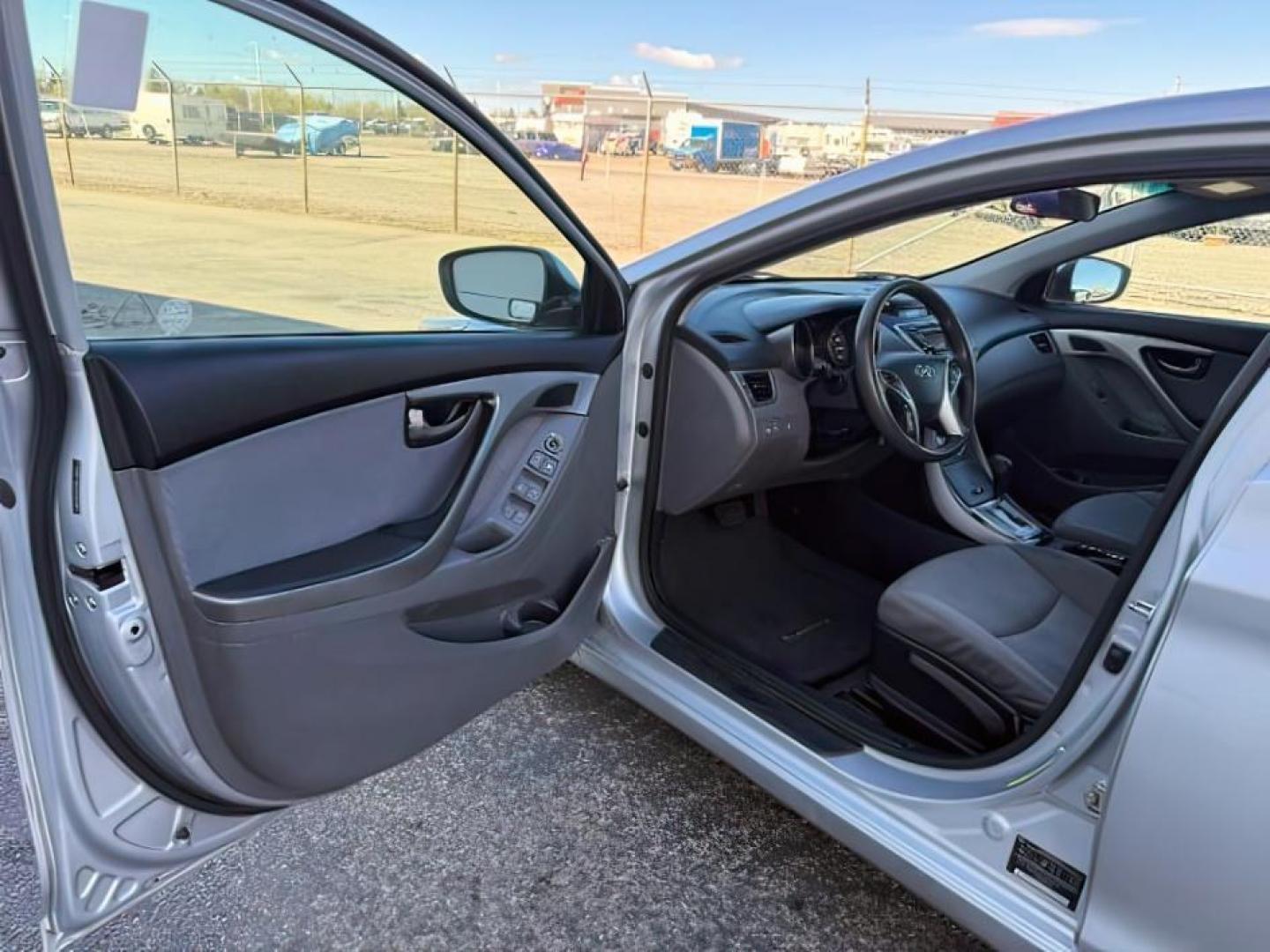 2012 SILVER /Gray Cloth Interior Hyundai Elantra (5NPDH4AE4CH) with an 18L L4 DOHC 16V engine, Automatic transmission, located at 1175 N Woodruff Ave, Idaho Falls, ID, 83401, 43.506901, -111.999657 - At Timberline Auto, finding a great deal on your next vehicle is always easy! Our experienced sales staff's goal is to help find you the right vehicle at the right price! Our knowledgeable finance department has options for almost any credit score. We offer extended service contract options to prote - Photo#10