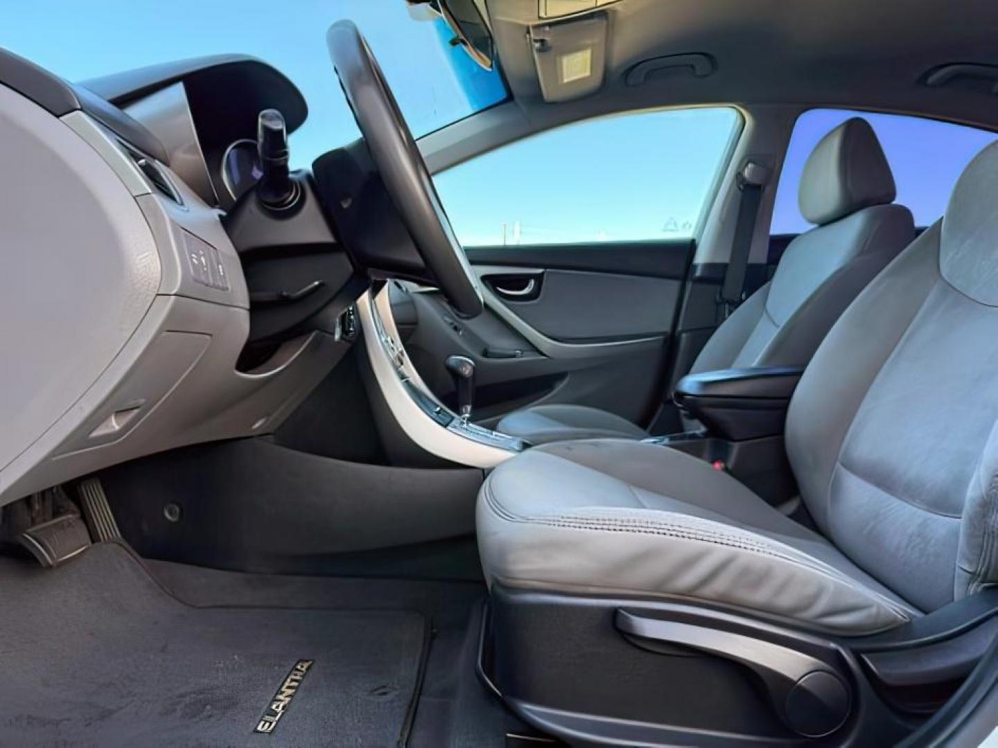 2012 SILVER /Gray Cloth Interior Hyundai Elantra (5NPDH4AE4CH) with an 18L L4 DOHC 16V engine, Automatic transmission, located at 1175 N Woodruff Ave, Idaho Falls, ID, 83401, 43.506901, -111.999657 - At Timberline Auto, finding a great deal on your next vehicle is always easy! Our experienced sales staff's goal is to help find you the right vehicle at the right price! Our knowledgeable finance department has options for almost any credit score. We offer extended service contract options to prote - Photo#11