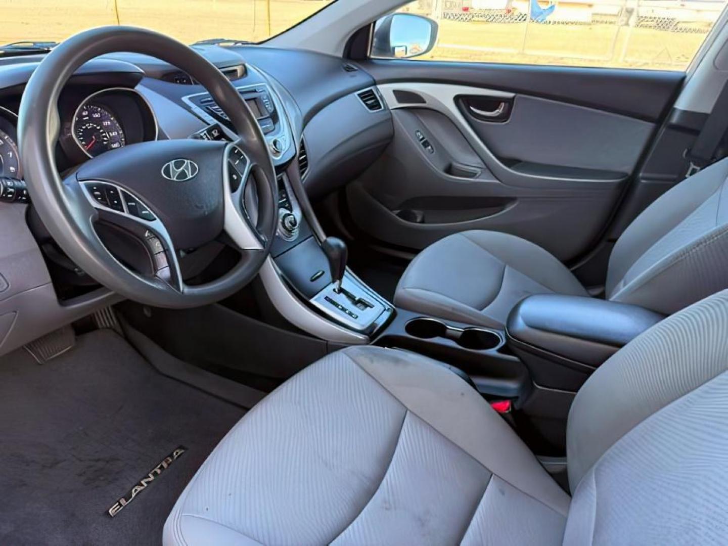 2012 SILVER /Gray Cloth Interior Hyundai Elantra (5NPDH4AE4CH) with an 18L L4 DOHC 16V engine, Automatic transmission, located at 1175 N Woodruff Ave, Idaho Falls, ID, 83401, 43.506901, -111.999657 - At Timberline Auto, finding a great deal on your next vehicle is always easy! Our experienced sales staff's goal is to help find you the right vehicle at the right price! Our knowledgeable finance department has options for almost any credit score. We offer extended service contract options to prote - Photo#12