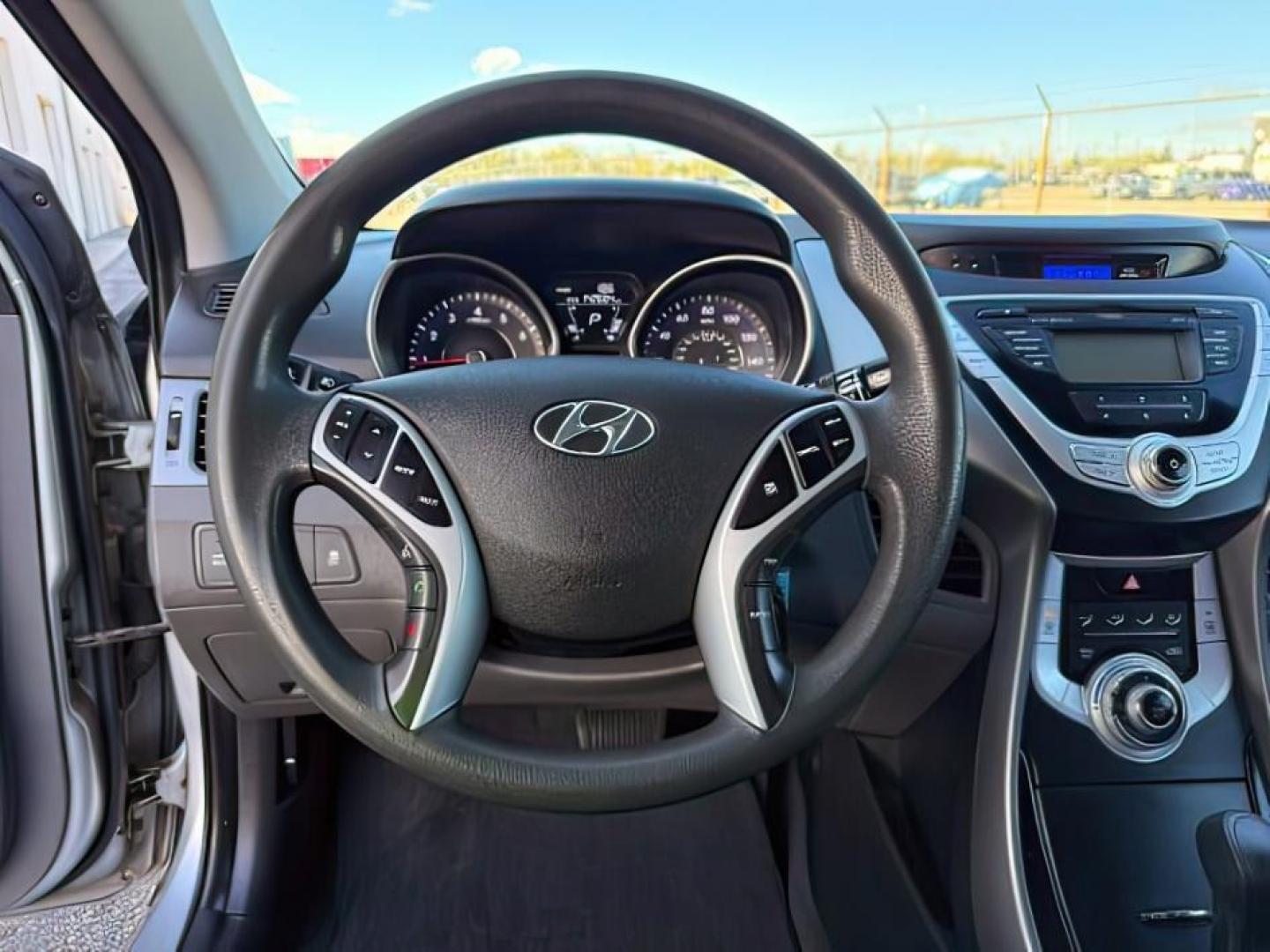 2012 SILVER /Gray Cloth Interior Hyundai Elantra (5NPDH4AE4CH) with an 18L L4 DOHC 16V engine, Automatic transmission, located at 1175 N Woodruff Ave, Idaho Falls, ID, 83401, 43.506901, -111.999657 - At Timberline Auto, finding a great deal on your next vehicle is always easy! Our experienced sales staff's goal is to help find you the right vehicle at the right price! Our knowledgeable finance department has options for almost any credit score. We offer extended service contract options to prote - Photo#13