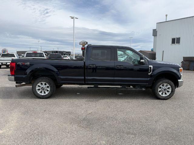 2021 BLUE /Medium Earth Gray Ford F-350 SD XLT Crew Cab Long Bed 4WD (1FT8W3B61ME) with an 6.2L V8 OHV 16V engine, 6-Speed Automatic transmission, located at 1235 N Woodruff Ave., Idaho Falls, 83401, (208) 523-1053, 43.507172, -112.000488 - At Timberline Auto, finding a great deal on your next vehicle is always easy! Our experienced sales staff's goal is to help find you the right vehicle at the right price! Our knowledgeable finance department has options for almost any credit score. We offer extended service contract options to prote- Photo#27