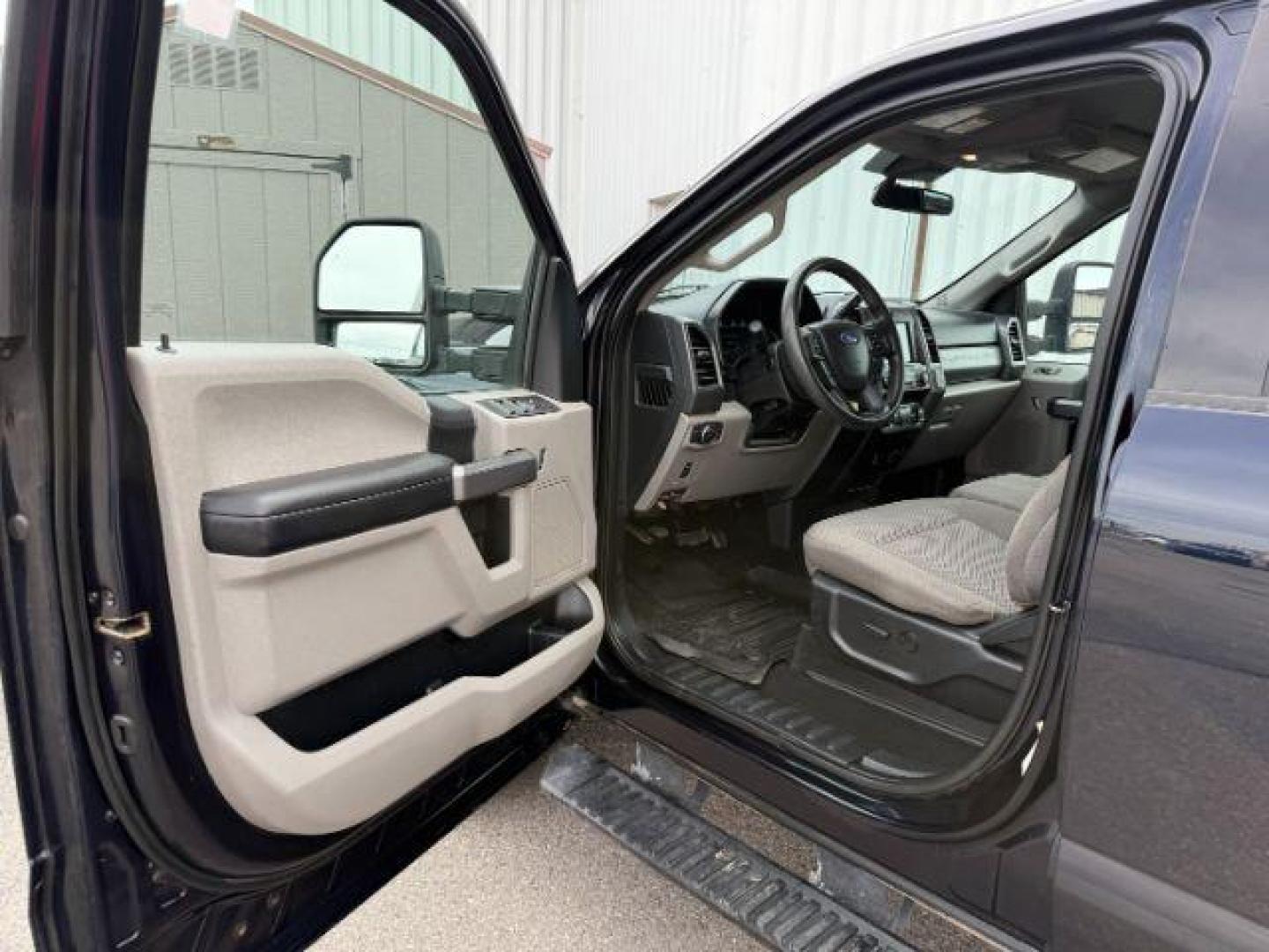 2021 BLUE /Medium Earth Gray Ford F-350 SD XLT Crew Cab Long Bed 4WD (1FT8W3B61ME) with an 6.2L V8 OHV 16V engine, 6-Speed Automatic transmission, located at 1235 N Woodruff Ave., Idaho Falls, 83401, (208) 523-1053, 43.507172, -112.000488 - At Timberline Auto, finding a great deal on your next vehicle is always easy! Our experienced sales staff's goal is to help find you the right vehicle at the right price! Our knowledgeable finance department has options for almost any credit score. We offer extended service contract options to prote - Photo#32