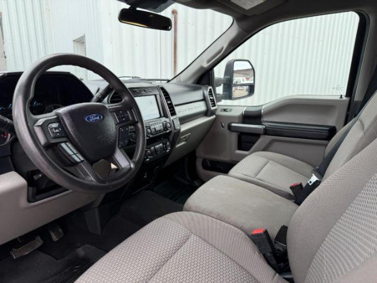 2021 BLUE /Medium Earth Gray Ford F-350 SD XLT Crew Cab Long Bed 4WD (1FT8W3B61ME) with an 6.2L V8 OHV 16V engine, 6-Speed Automatic transmission, located at 1235 N Woodruff Ave., Idaho Falls, 83401, (208) 523-1053, 43.507172, -112.000488 - At Timberline Auto, finding a great deal on your next vehicle is always easy! Our experienced sales staff's goal is to help find you the right vehicle at the right price! Our knowledgeable finance department has options for almost any credit score. We offer extended service contract options to prote - Photo#34