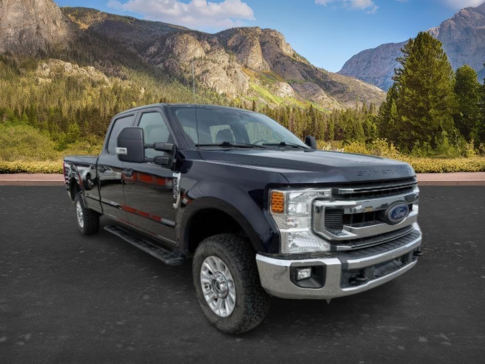 2021 BLUE /Medium Earth Gray Ford F-350 SD XLT Crew Cab Long Bed 4WD (1FT8W3B61ME) with an 6.2L V8 OHV 16V engine, 6-Speed Automatic transmission, located at 1235 N Woodruff Ave., Idaho Falls, 83401, (208) 523-1053, 43.507172, -112.000488 - At Timberline Auto, finding a great deal on your next vehicle is always easy! Our experienced sales staff's goal is to help find you the right vehicle at the right price! Our knowledgeable finance department has options for almost any credit score. We offer extended service contract options to prote- Photo#6