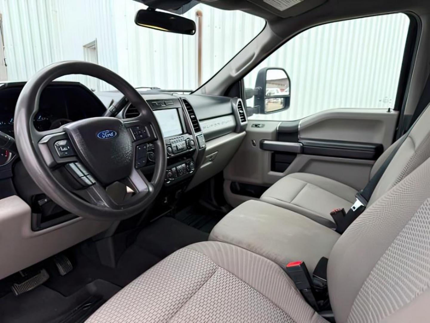 2021 BLUE /Medium Earth Gray Ford F-350 SD XLT Crew Cab Long Bed 4WD (1FT8W3B61ME) with an 6.2L V8 OHV 16V engine, 6-Speed Automatic transmission, located at 1235 N Woodruff Ave., Idaho Falls, 83401, (208) 523-1053, 43.507172, -112.000488 - At Timberline Auto, finding a great deal on your next vehicle is always easy! Our experienced sales staff's goal is to help find you the right vehicle at the right price! Our knowledgeable finance department has options for almost any credit score. We offer extended service contract options to prote - Photo#12