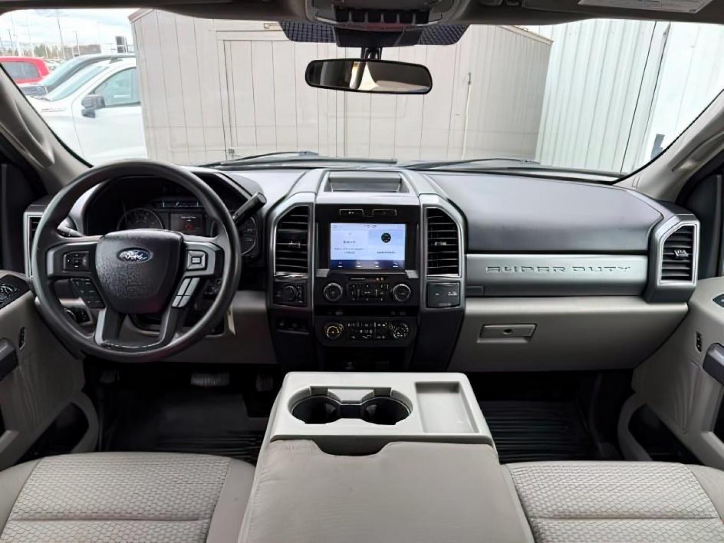 2021 BLUE /Medium Earth Gray Ford F-350 SD XLT Crew Cab Long Bed 4WD (1FT8W3B61ME) with an 6.2L V8 OHV 16V engine, 6-Speed Automatic transmission, located at 1235 N Woodruff Ave., Idaho Falls, 83401, (208) 523-1053, 43.507172, -112.000488 - At Timberline Auto, finding a great deal on your next vehicle is always easy! Our experienced sales staff's goal is to help find you the right vehicle at the right price! Our knowledgeable finance department has options for almost any credit score. We offer extended service contract options to prote - Photo#20