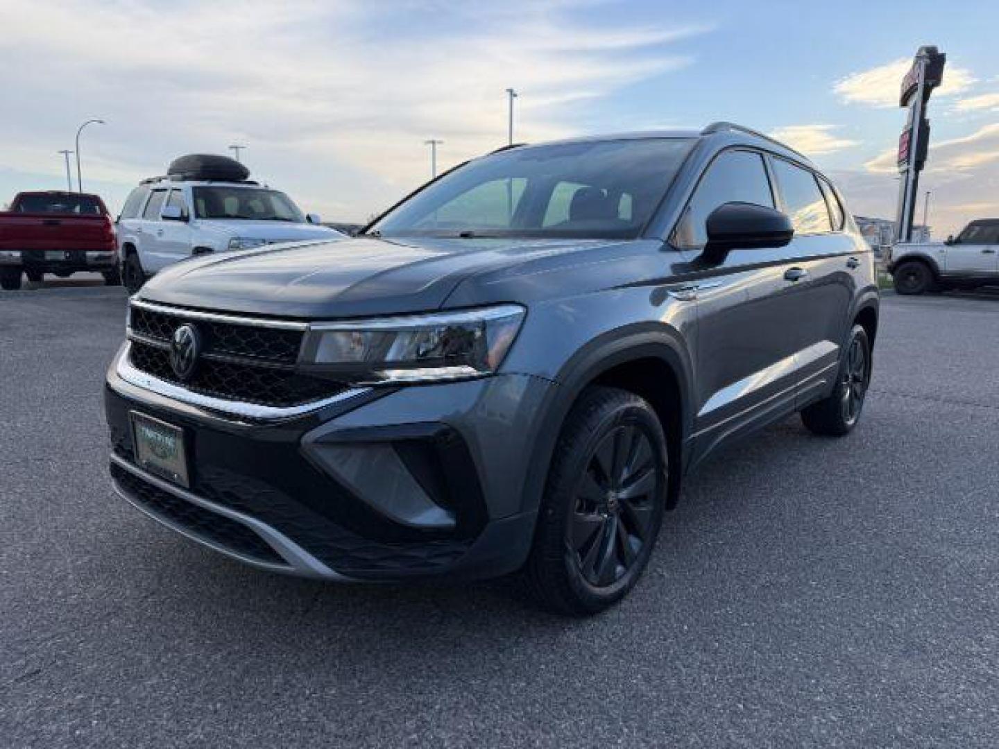 2023 GRAY /Gray/Black Volkswagen Taos (3VVCX7B23PM) with an 15L I-4 gasoline direct injection engine, Automatic transmission, located at 1175 N Woodruff Ave, Idaho Falls, ID, 83401, 43.506901, -111.999657 - At Timberline Auto, finding a great deal on your next vehicle is always easy! Our experienced sales staff's goal is to help find you the right vehicle at the right price! Our knowledgeable finance department has options for almost any credit score. We offer extended service contract options to prote - Photo#25