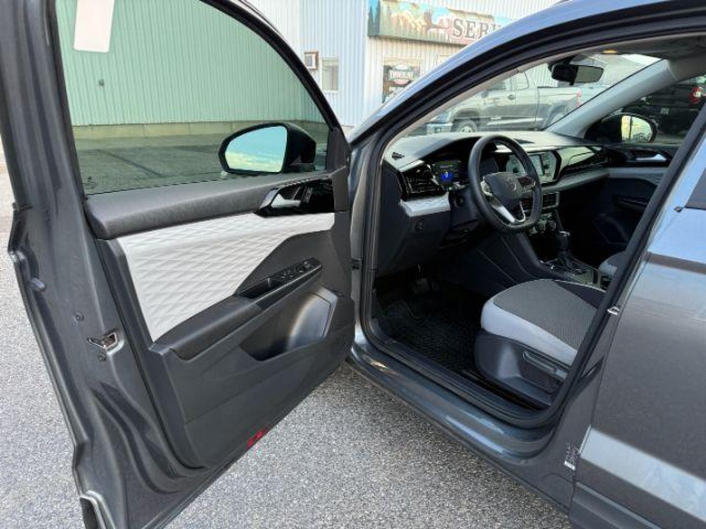 2023 GRAY /Gray/Black Volkswagen Taos (3VVCX7B23PM) with an 15L I-4 gasoline direct injection engine, Automatic transmission, located at 1175 N Woodruff Ave, Idaho Falls, ID, 83401, 43.506901, -111.999657 - At Timberline Auto, finding a great deal on your next vehicle is always easy! Our experienced sales staff's goal is to help find you the right vehicle at the right price! Our knowledgeable finance department has options for almost any credit score. We offer extended service contract options to prote - Photo#38