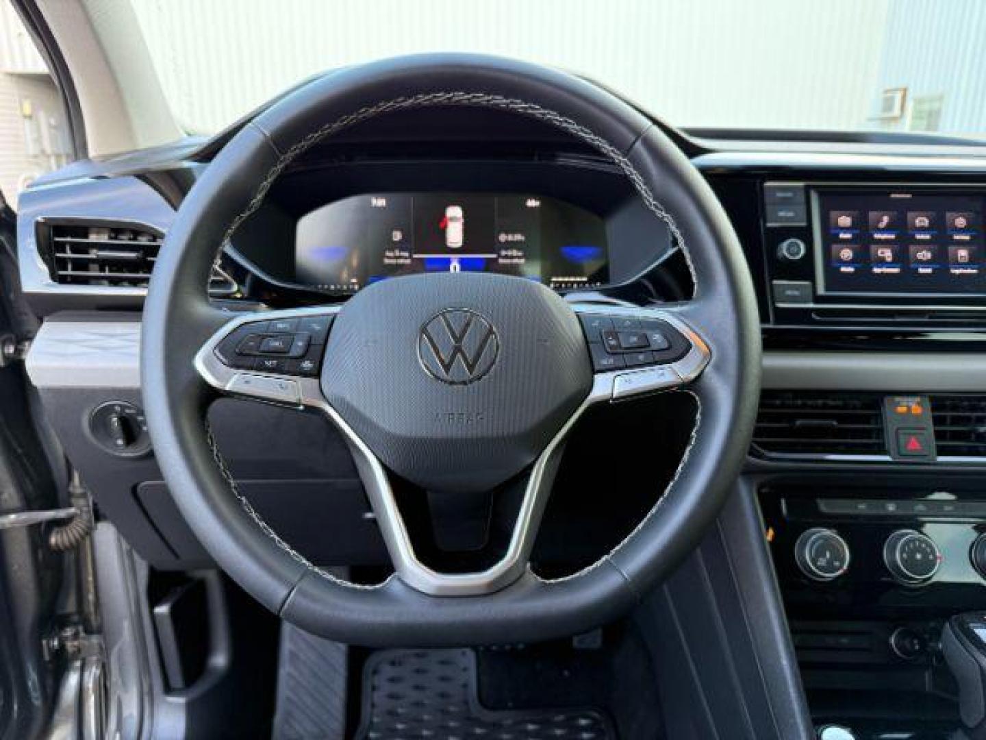 2023 GRAY /Gray/Black Volkswagen Taos (3VVCX7B23PM) with an 15L I-4 gasoline direct injection engine, Automatic transmission, located at 1175 N Woodruff Ave, Idaho Falls, ID, 83401, 43.506901, -111.999657 - At Timberline Auto, finding a great deal on your next vehicle is always easy! Our experienced sales staff's goal is to help find you the right vehicle at the right price! Our knowledgeable finance department has options for almost any credit score. We offer extended service contract options to prote - Photo#41