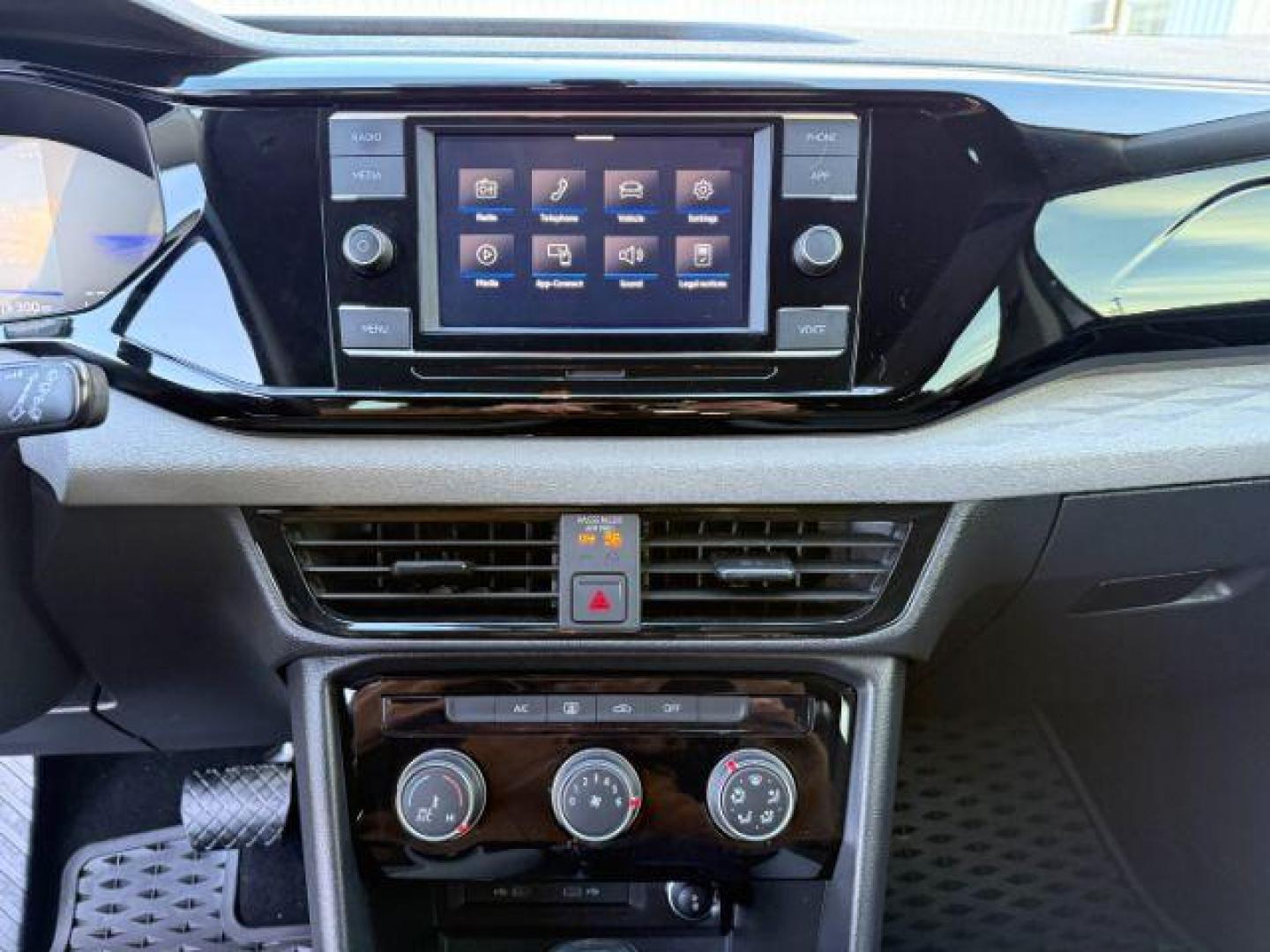 2023 GRAY /Gray/Black Volkswagen Taos (3VVCX7B23PM) with an 15L I-4 gasoline direct injection engine, Automatic transmission, located at 1175 N Woodruff Ave, Idaho Falls, ID, 83401, 43.506901, -111.999657 - At Timberline Auto, finding a great deal on your next vehicle is always easy! Our experienced sales staff's goal is to help find you the right vehicle at the right price! Our knowledgeable finance department has options for almost any credit score. We offer extended service contract options to prote - Photo#42