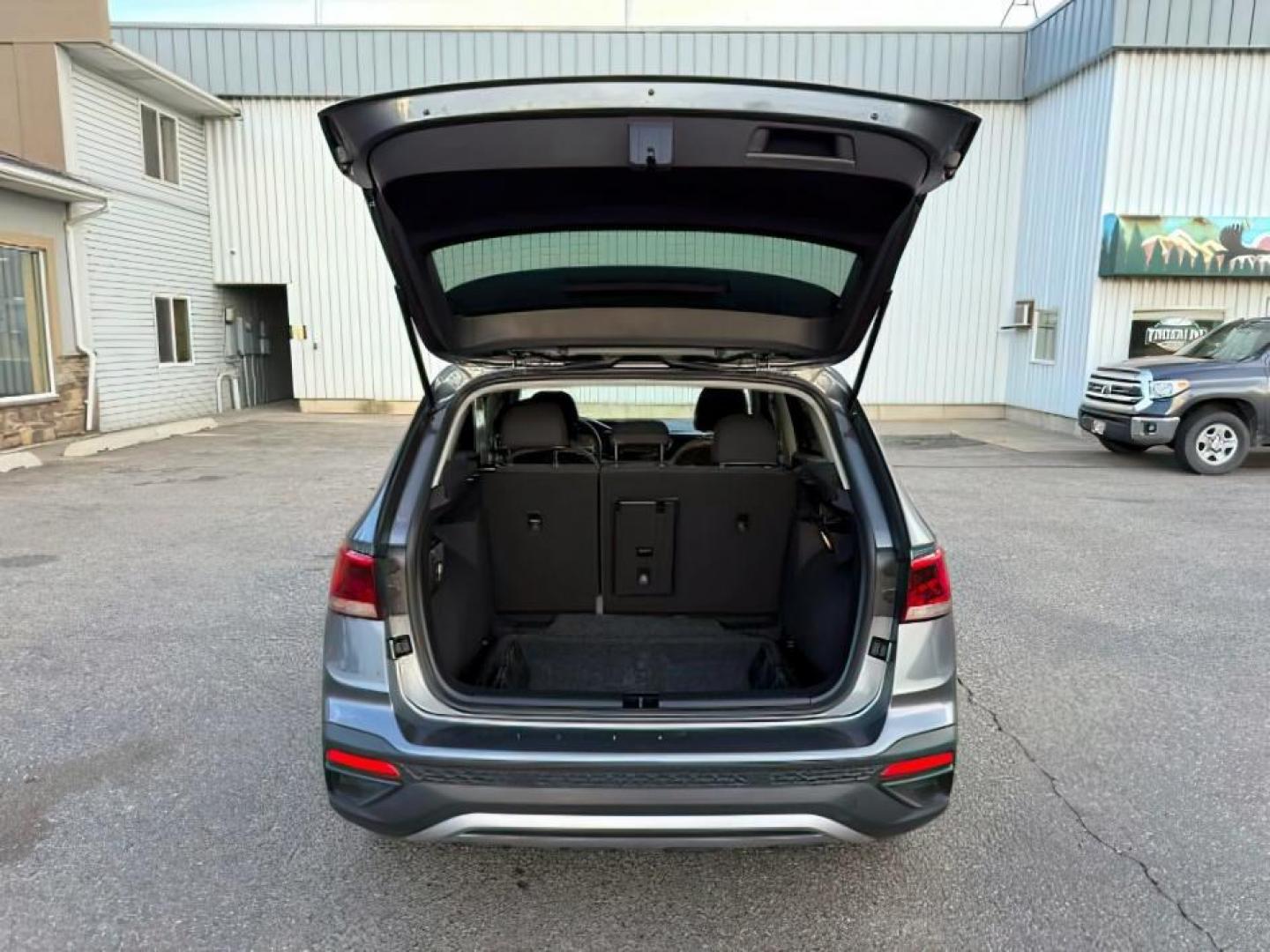 2023 GRAY /Gray/Black Volkswagen Taos (3VVCX7B23PM) with an 15L I-4 gasoline direct injection engine, Automatic transmission, located at 1175 N Woodruff Ave, Idaho Falls, ID, 83401, 43.506901, -111.999657 - At Timberline Auto, finding a great deal on your next vehicle is always easy! Our experienced sales staff's goal is to help find you the right vehicle at the right price! Our knowledgeable finance department has options for almost any credit score. We offer extended service contract options to prote - Photo#5