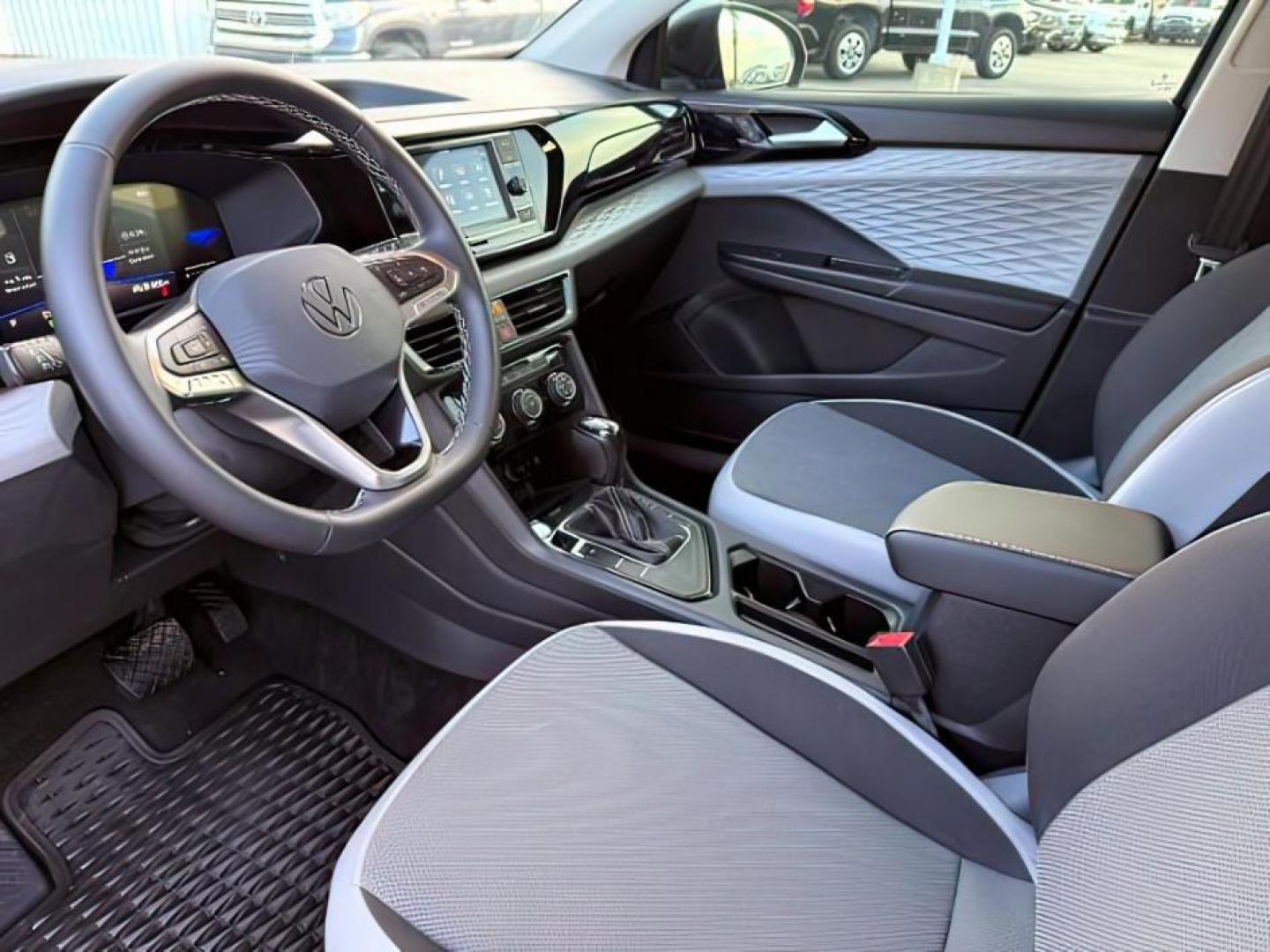 2023 GRAY /Gray/Black Volkswagen Taos (3VVCX7B23PM) with an 15L I-4 gasoline direct injection engine, Automatic transmission, located at 1175 N Woodruff Ave, Idaho Falls, ID, 83401, 43.506901, -111.999657 - At Timberline Auto, finding a great deal on your next vehicle is always easy! Our experienced sales staff's goal is to help find you the right vehicle at the right price! Our knowledgeable finance department has options for almost any credit score. We offer extended service contract options to prote - Photo#15