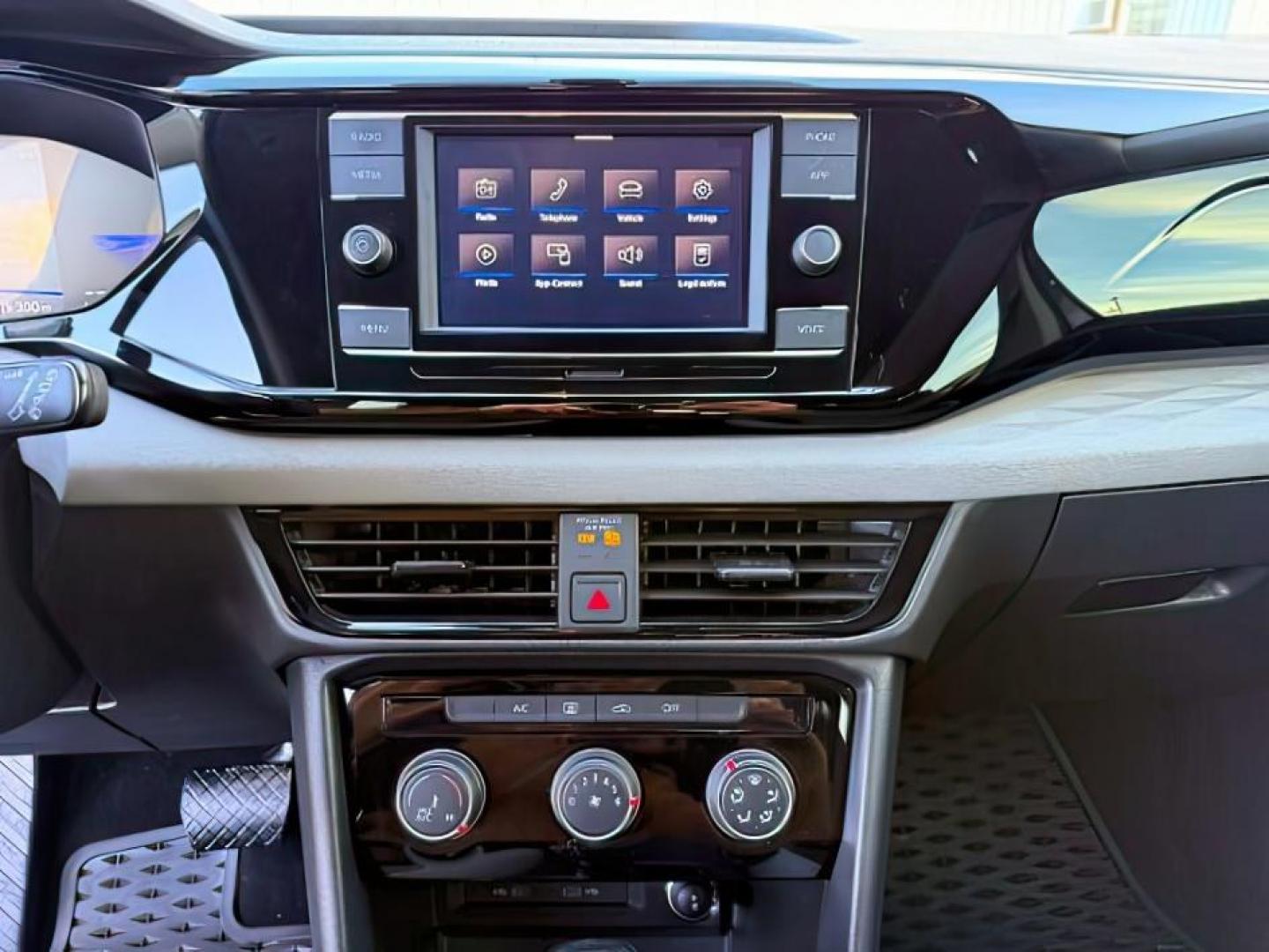 2023 GRAY /Gray/Black Volkswagen Taos (3VVCX7B23PM) with an 15L I-4 gasoline direct injection engine, Automatic transmission, located at 1175 N Woodruff Ave, Idaho Falls, ID, 83401, 43.506901, -111.999657 - At Timberline Auto, finding a great deal on your next vehicle is always easy! Our experienced sales staff's goal is to help find you the right vehicle at the right price! Our knowledgeable finance department has options for almost any credit score. We offer extended service contract options to prote - Photo#17