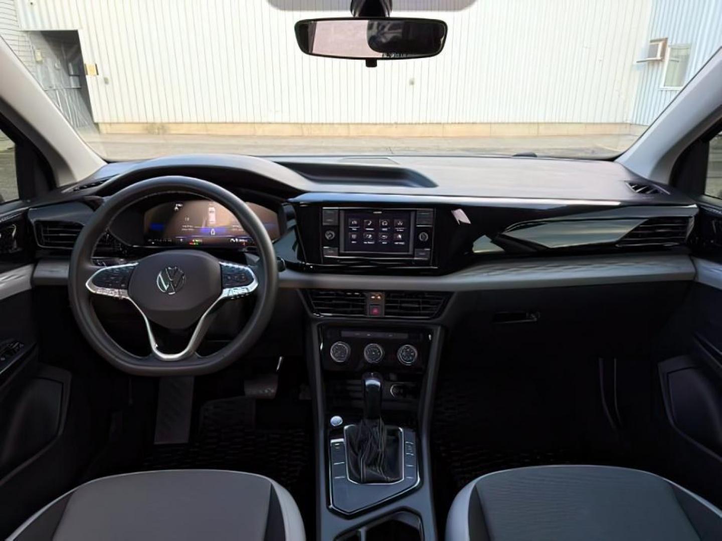 2023 GRAY /Gray/Black Volkswagen Taos (3VVCX7B23PM) with an 15L I-4 gasoline direct injection engine, Automatic transmission, located at 1175 N Woodruff Ave, Idaho Falls, ID, 83401, 43.506901, -111.999657 - At Timberline Auto, finding a great deal on your next vehicle is always easy! Our experienced sales staff's goal is to help find you the right vehicle at the right price! Our knowledgeable finance department has options for almost any credit score. We offer extended service contract options to prote - Photo#22