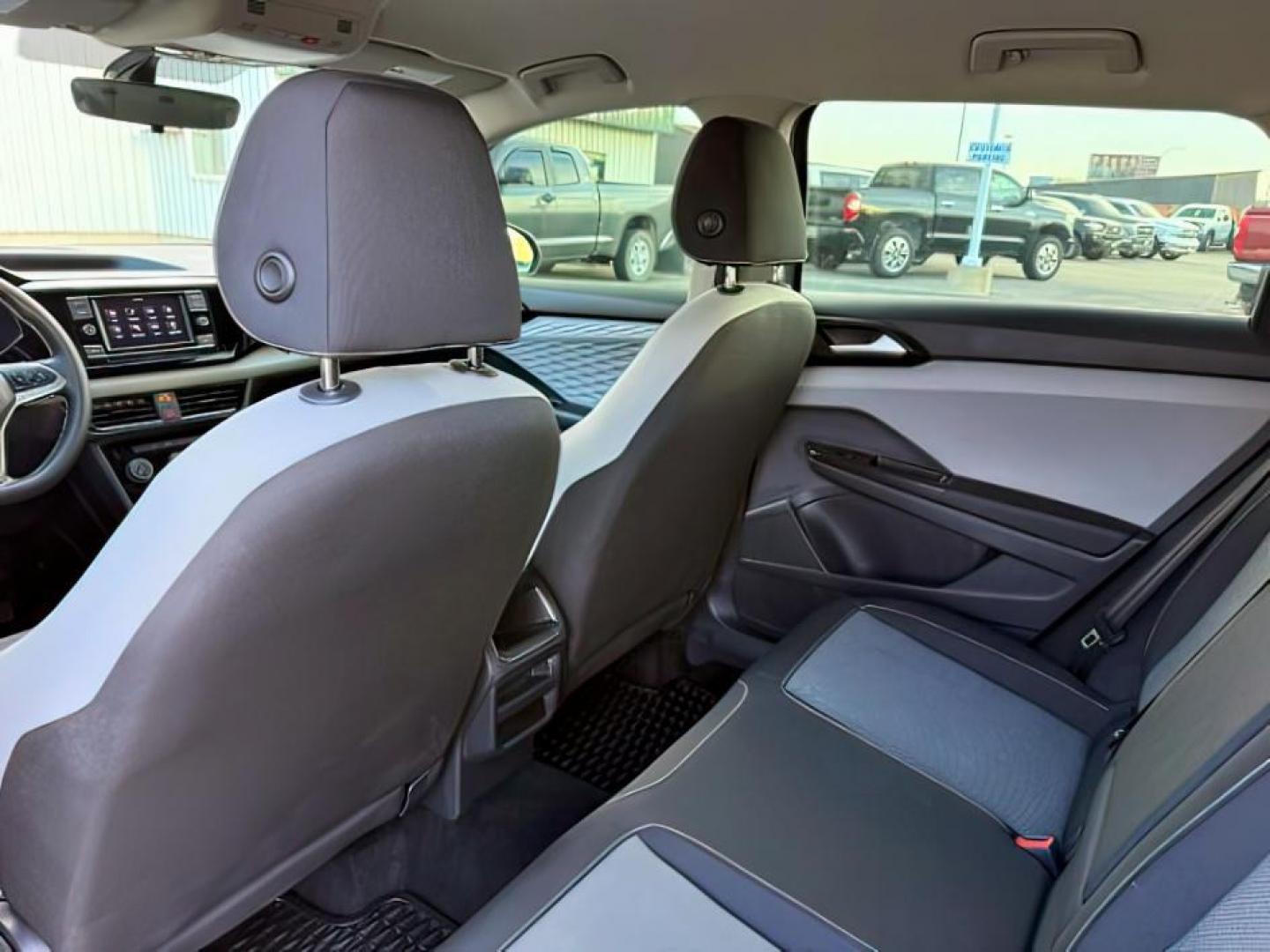 2023 GRAY /Gray/Black Volkswagen Taos (3VVCX7B23PM) with an 15L I-4 gasoline direct injection engine, Automatic transmission, located at 1175 N Woodruff Ave, Idaho Falls, ID, 83401, 43.506901, -111.999657 - At Timberline Auto, finding a great deal on your next vehicle is always easy! Our experienced sales staff's goal is to help find you the right vehicle at the right price! Our knowledgeable finance department has options for almost any credit score. We offer extended service contract options to prote - Photo#23