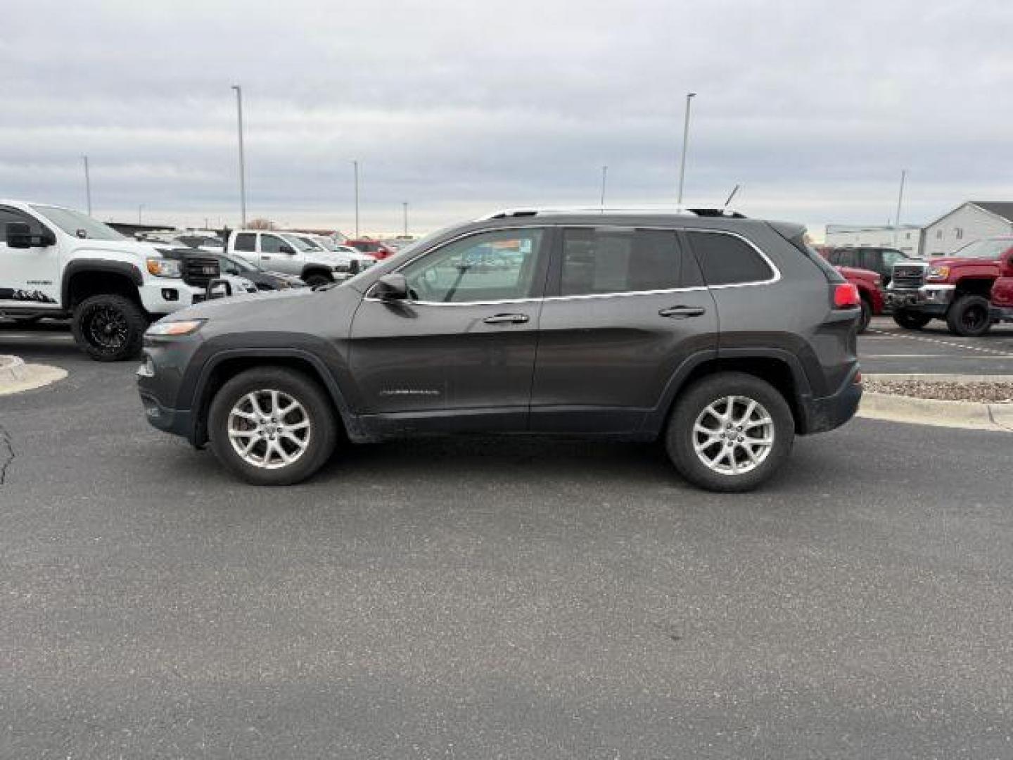 2014 GRAY /Black Jeep Cherokee (1C4PJMCSXEW) with an 32L V-6 DOHC engine, Automatic transmission, located at 1175 N Woodruff Ave, Idaho Falls, ID, 83401, 43.506901, -111.999657 - At Timberline Auto, finding a great deal on your next vehicle is always easy! Our experienced sales staff's goal is to help find you the right vehicle at the right price! Our knowledgeable finance department has options for almost any credit score. We offer extended service contract options to prote - Photo#1