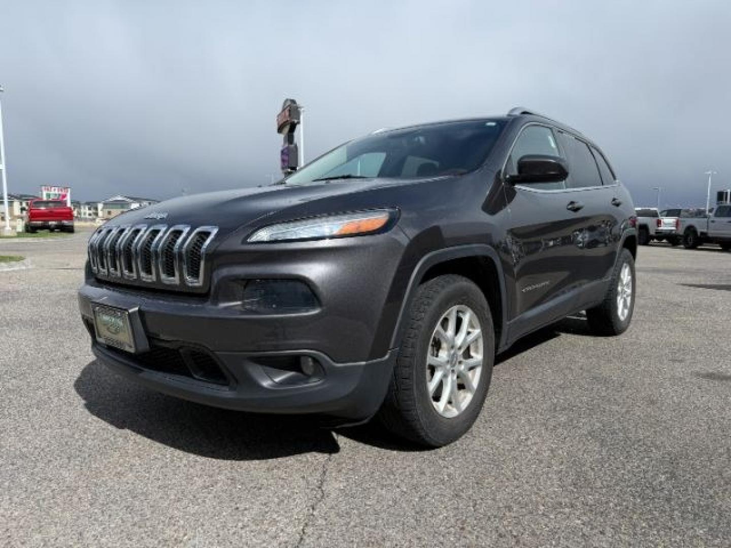 2014 GRAY /Black Jeep Cherokee (1C4PJMCSXEW) with an 32L V-6 DOHC engine, Automatic transmission, located at 1175 N Woodruff Ave, Idaho Falls, ID, 83401, 43.506901, -111.999657 - At Timberline Auto, finding a great deal on your next vehicle is always easy! Our experienced sales staff's goal is to help find you the right vehicle at the right price! Our knowledgeable finance department has options for almost any credit score. We offer extended service contract options to prote - Photo#27