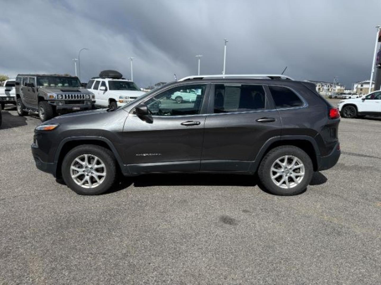 2014 GRAY /Black Jeep Cherokee (1C4PJMCSXEW) with an 32L V-6 DOHC engine, Automatic transmission, located at 1175 N Woodruff Ave, Idaho Falls, ID, 83401, 43.506901, -111.999657 - At Timberline Auto, finding a great deal on your next vehicle is always easy! Our experienced sales staff's goal is to help find you the right vehicle at the right price! Our knowledgeable finance department has options for almost any credit score. We offer extended service contract options to prote - Photo#28