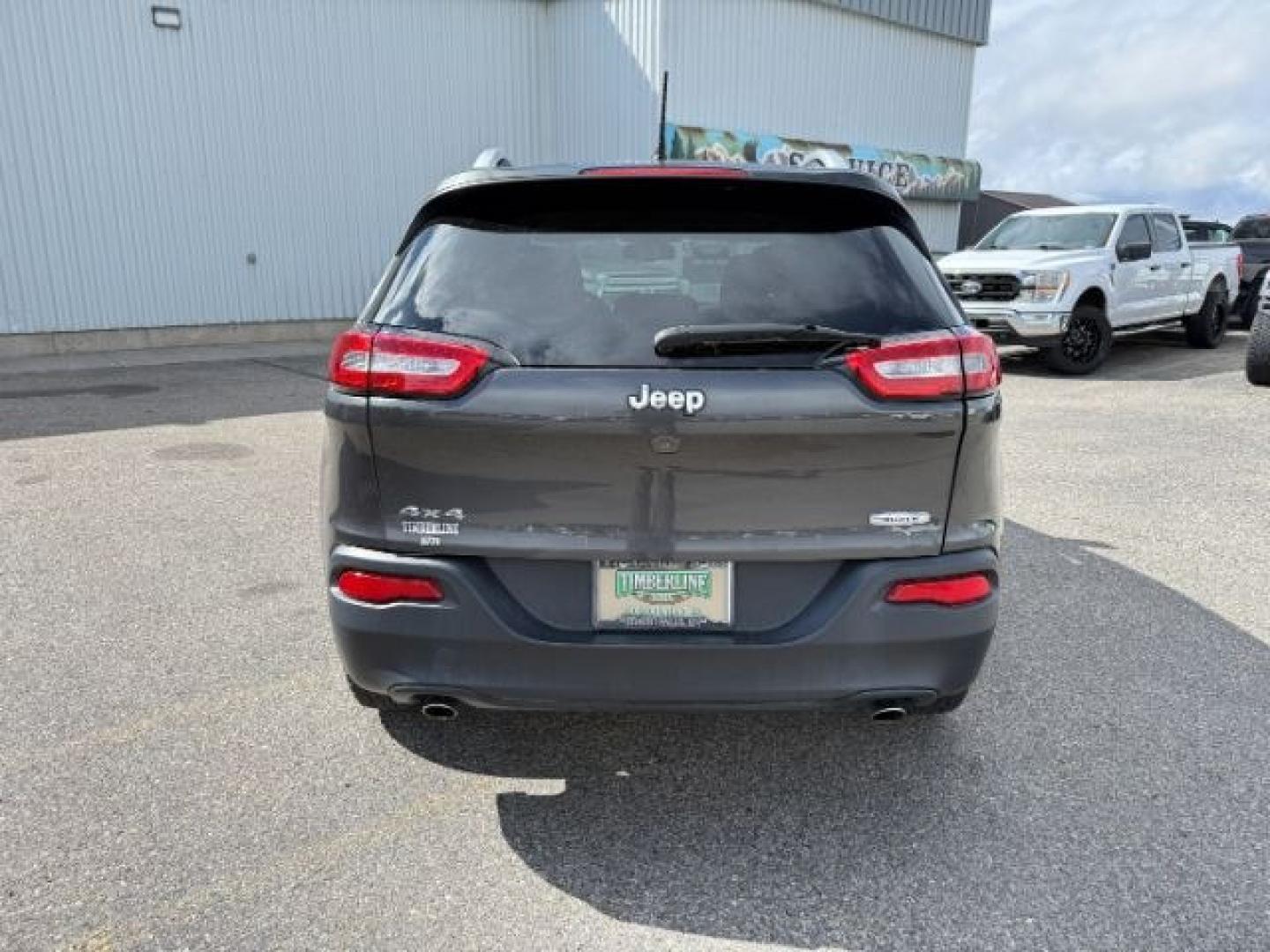 2014 GRAY /Black Jeep Cherokee (1C4PJMCSXEW) with an 32L V-6 DOHC engine, Automatic transmission, located at 1175 N Woodruff Ave, Idaho Falls, ID, 83401, 43.506901, -111.999657 - At Timberline Auto, finding a great deal on your next vehicle is always easy! Our experienced sales staff's goal is to help find you the right vehicle at the right price! Our knowledgeable finance department has options for almost any credit score. We offer extended service contract options to prote - Photo#30
