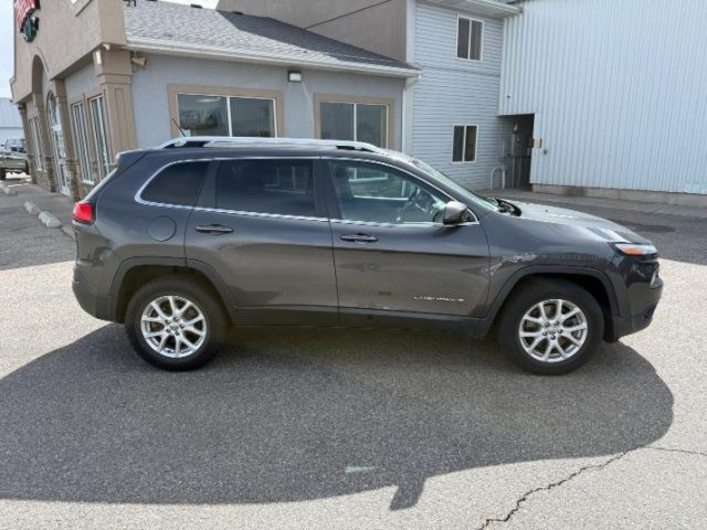 2014 GRAY /Black Jeep Cherokee (1C4PJMCSXEW) with an 32L V-6 DOHC engine, Automatic transmission, located at 1175 N Woodruff Ave, Idaho Falls, ID, 83401, 43.506901, -111.999657 - At Timberline Auto, finding a great deal on your next vehicle is always easy! Our experienced sales staff's goal is to help find you the right vehicle at the right price! Our knowledgeable finance department has options for almost any credit score. We offer extended service contract options to prote - Photo#36