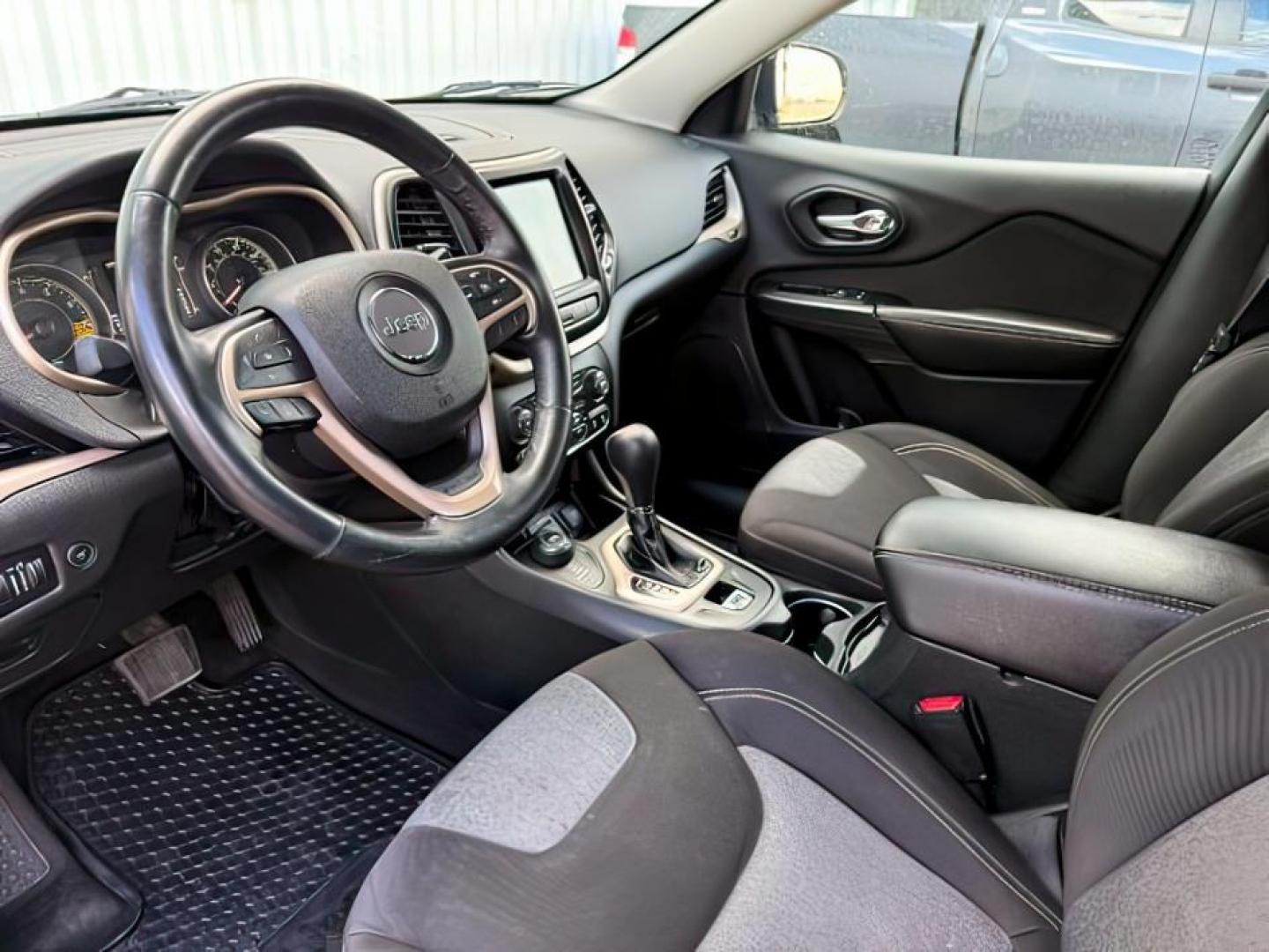 2014 GRAY /Black Jeep Cherokee (1C4PJMCSXEW) with an 32L V-6 DOHC engine, Automatic transmission, located at 1175 N Woodruff Ave, Idaho Falls, ID, 83401, 43.506901, -111.999657 - At Timberline Auto, finding a great deal on your next vehicle is always easy! Our experienced sales staff's goal is to help find you the right vehicle at the right price! Our knowledgeable finance department has options for almost any credit score. We offer extended service contract options to prote - Photo#15