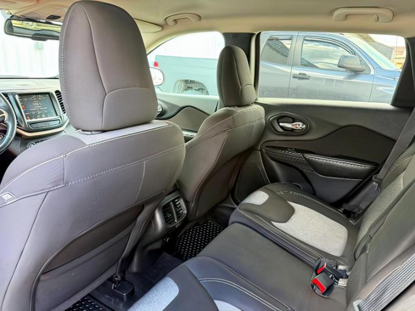 2014 GRAY /Black Jeep Cherokee (1C4PJMCSXEW) with an 32L V-6 DOHC engine, Automatic transmission, located at 1175 N Woodruff Ave, Idaho Falls, ID, 83401, 43.506901, -111.999657 - At Timberline Auto, finding a great deal on your next vehicle is always easy! Our experienced sales staff's goal is to help find you the right vehicle at the right price! Our knowledgeable finance department has options for almost any credit score. We offer extended service contract options to prote - Photo#25