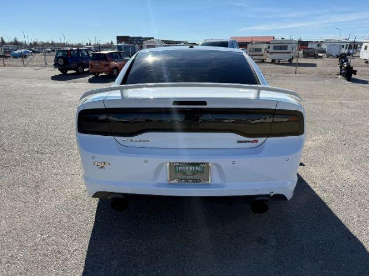 2012 Bright White Clearcoat /Black Dodge Charger (2C3CDXEJ9CH) with an HEMI 64L V-8 premium unleaded engine, Automatic transmission, located at 1175 N Woodruff Ave, Idaho Falls, ID, 83401, 43.506901, -111.999657 - At Timberline Auto, finding a great deal on your next vehicle is always easy! Our experienced sales staff's goal is to help find you the right vehicle at the right price! Our knowledgeable finance department has options for almost any credit score. We offer extended service contract options to prote - Photo#3