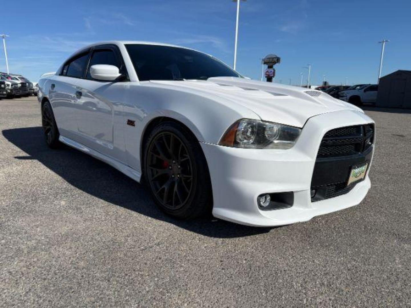 2012 Bright White Clearcoat /Black Dodge Charger (2C3CDXEJ9CH) with an HEMI 64L V-8 premium unleaded engine, Automatic transmission, located at 1175 N Woodruff Ave, Idaho Falls, ID, 83401, 43.506901, -111.999657 - At Timberline Auto, finding a great deal on your next vehicle is always easy! Our experienced sales staff's goal is to help find you the right vehicle at the right price! Our knowledgeable finance department has options for almost any credit score. We offer extended service contract options to prote - Photo#8