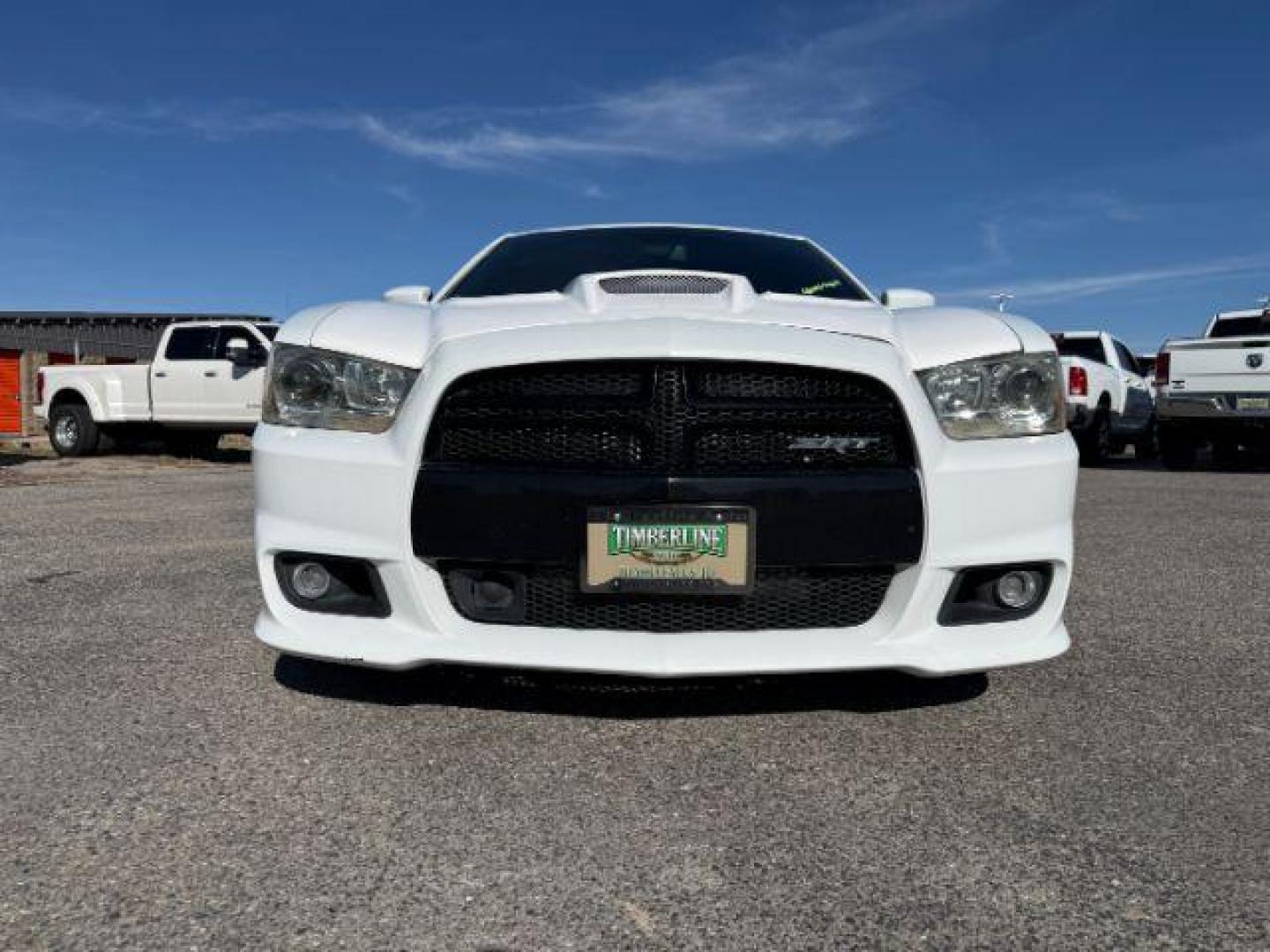 2012 Bright White Clearcoat /Black Dodge Charger (2C3CDXEJ9CH) with an HEMI 64L V-8 premium unleaded engine, Automatic transmission, located at 1175 N Woodruff Ave, Idaho Falls, ID, 83401, 43.506901, -111.999657 - At Timberline Auto, finding a great deal on your next vehicle is always easy! Our experienced sales staff's goal is to help find you the right vehicle at the right price! Our knowledgeable finance department has options for almost any credit score. We offer extended service contract options to prote - Photo#9