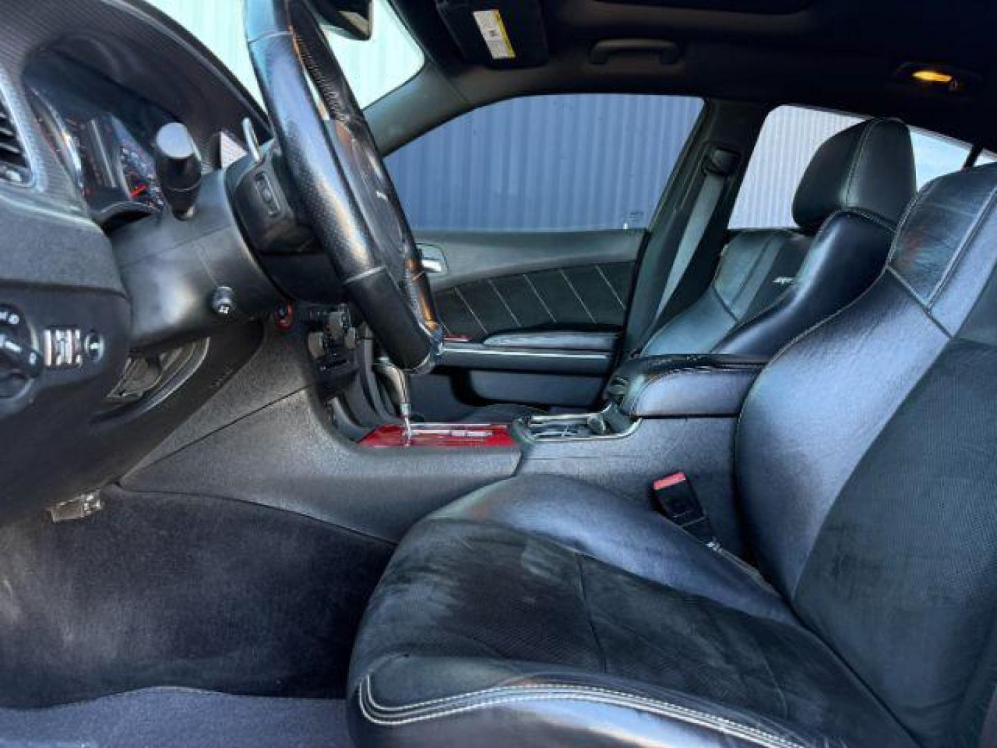 2012 Bright White Clearcoat /Black Dodge Charger (2C3CDXEJ9CH) with an HEMI 64L V-8 premium unleaded engine, Automatic transmission, located at 1175 N Woodruff Ave, Idaho Falls, ID, 83401, 43.506901, -111.999657 - At Timberline Auto, finding a great deal on your next vehicle is always easy! Our experienced sales staff's goal is to help find you the right vehicle at the right price! Our knowledgeable finance department has options for almost any credit score. We offer extended service contract options to prote - Photo#12