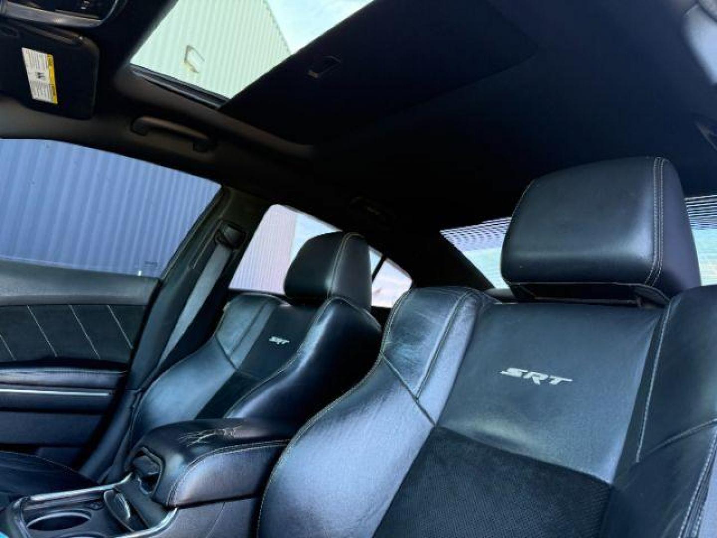 2012 Bright White Clearcoat /Black Dodge Charger (2C3CDXEJ9CH) with an HEMI 64L V-8 premium unleaded engine, Automatic transmission, located at 1175 N Woodruff Ave, Idaho Falls, ID, 83401, 43.506901, -111.999657 - At Timberline Auto, finding a great deal on your next vehicle is always easy! Our experienced sales staff's goal is to help find you the right vehicle at the right price! Our knowledgeable finance department has options for almost any credit score. We offer extended service contract options to prote - Photo#18