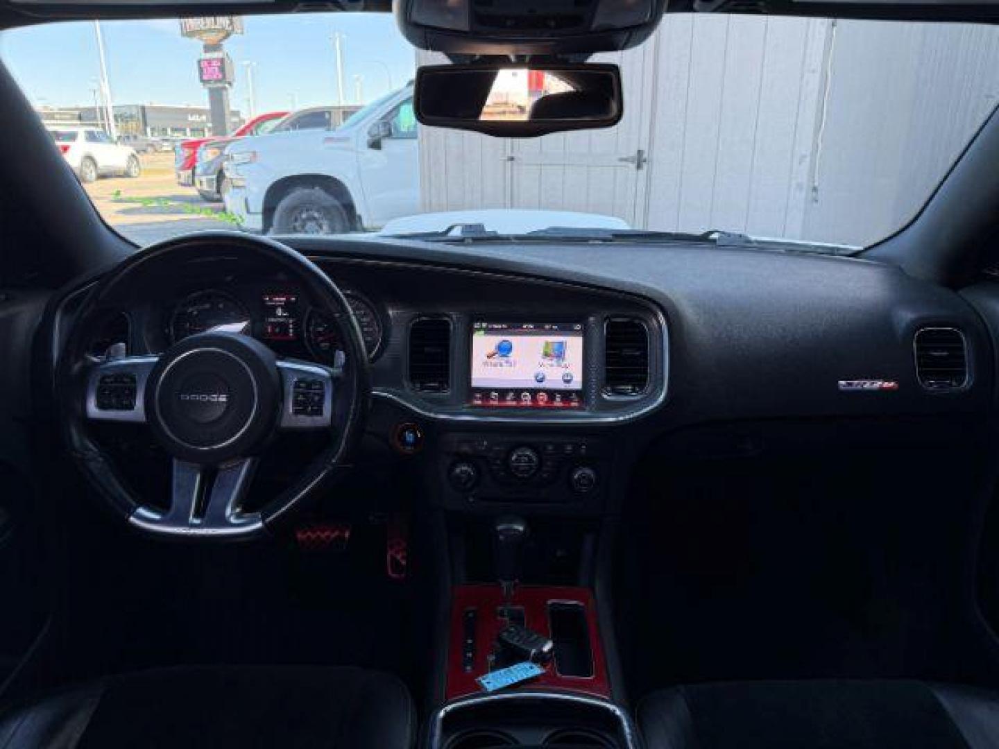 2012 Bright White Clearcoat /Black Dodge Charger (2C3CDXEJ9CH) with an HEMI 64L V-8 premium unleaded engine, Automatic transmission, located at 1175 N Woodruff Ave, Idaho Falls, ID, 83401, 43.506901, -111.999657 - At Timberline Auto, finding a great deal on your next vehicle is always easy! Our experienced sales staff's goal is to help find you the right vehicle at the right price! Our knowledgeable finance department has options for almost any credit score. We offer extended service contract options to prote - Photo#20