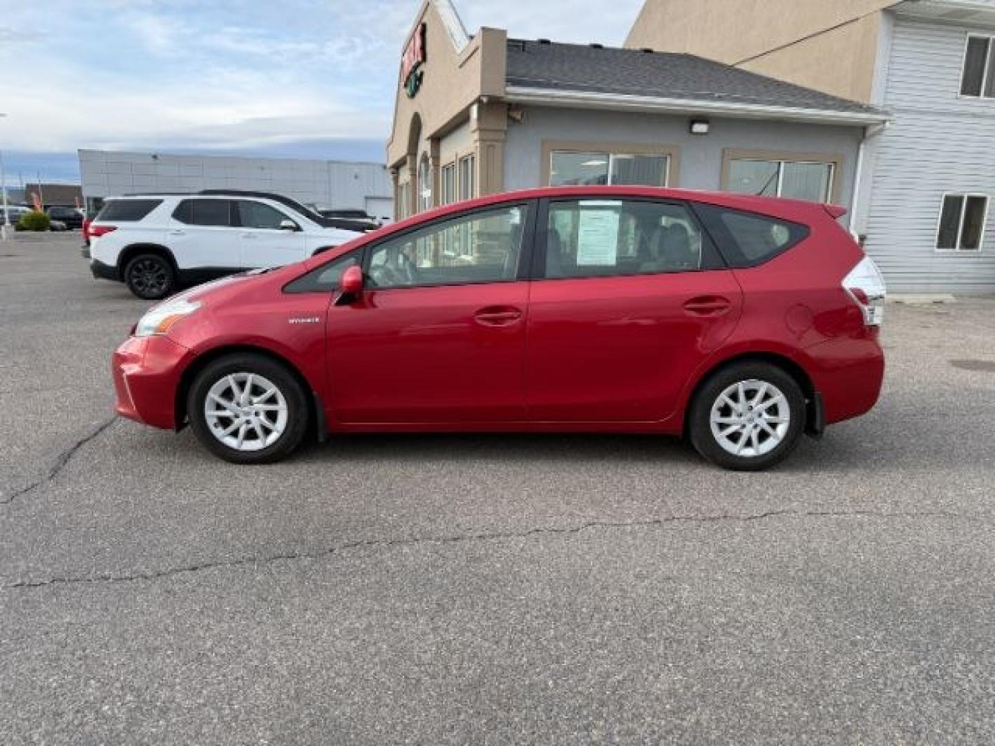 2014 RED /Dark Gray Toyota Prius v (JTDZN3EU5EJ) with an 18L I-4 DOHC engine, Automatic transmission, located at 1175 N Woodruff Ave, Idaho Falls, ID, 83401, 43.506901, -111.999657 - At Timberline Auto, finding a great deal on your next vehicle is always easy! Our experienced sales staff's goal is to help find you the right vehicle at the right price! Our knowledgeable finance department has options for almost any credit score. We offer extended service contract options to prote - Photo#27
