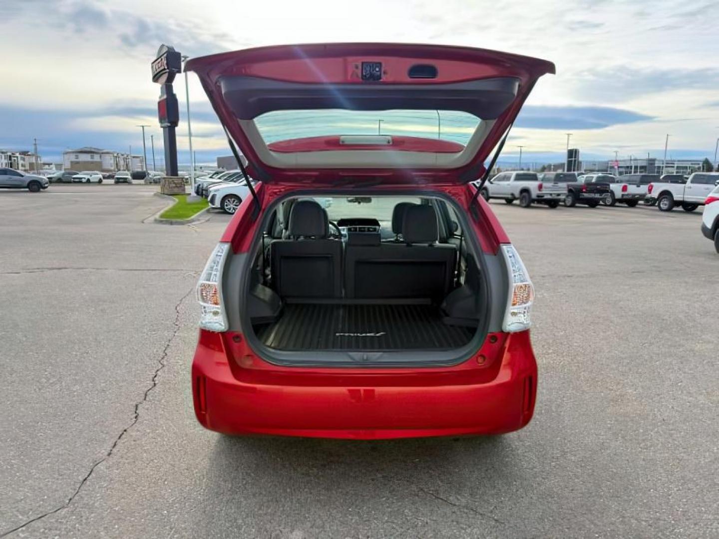 2014 RED /Dark Gray Toyota Prius v (JTDZN3EU5EJ) with an 18L I-4 DOHC engine, Automatic transmission, located at 1175 N Woodruff Ave, Idaho Falls, ID, 83401, 43.506901, -111.999657 - At Timberline Auto, finding a great deal on your next vehicle is always easy! Our experienced sales staff's goal is to help find you the right vehicle at the right price! Our knowledgeable finance department has options for almost any credit score. We offer extended service contract options to prote - Photo#5