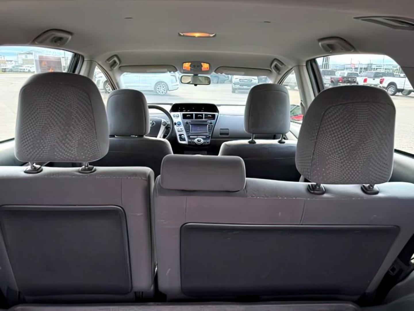 2014 RED /Dark Gray Toyota Prius v (JTDZN3EU5EJ) with an 18L I-4 DOHC engine, Automatic transmission, located at 1175 N Woodruff Ave, Idaho Falls, ID, 83401, 43.506901, -111.999657 - At Timberline Auto, finding a great deal on your next vehicle is always easy! Our experienced sales staff's goal is to help find you the right vehicle at the right price! Our knowledgeable finance department has options for almost any credit score. We offer extended service contract options to prote - Photo#6