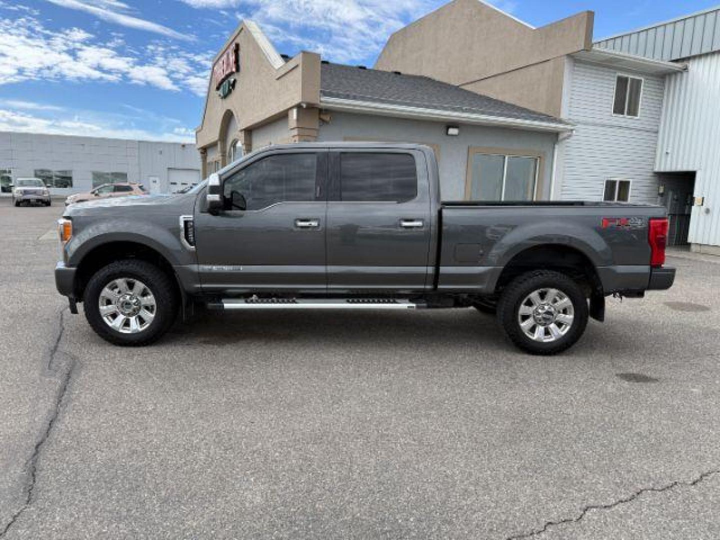 2019 GRAY /Black Ford F-350 Platinum (1FT8W3BT6KE) with an Powerstroke 6.7L V-8 diesel direct injection engine, AUTOMATIC transmission, located at 1235 N Woodruff Ave., Idaho Falls, 83401, (208) 523-1053, 43.507172, -112.000488 - At Timberline Auto, finding a great deal on your next vehicle is always easy! Our experienced sales staff's goal is to help find you the right vehicle at the right price! Our knowledgeable finance department has options for almost any credit score. We offer extended service contract options to prote - Photo#27