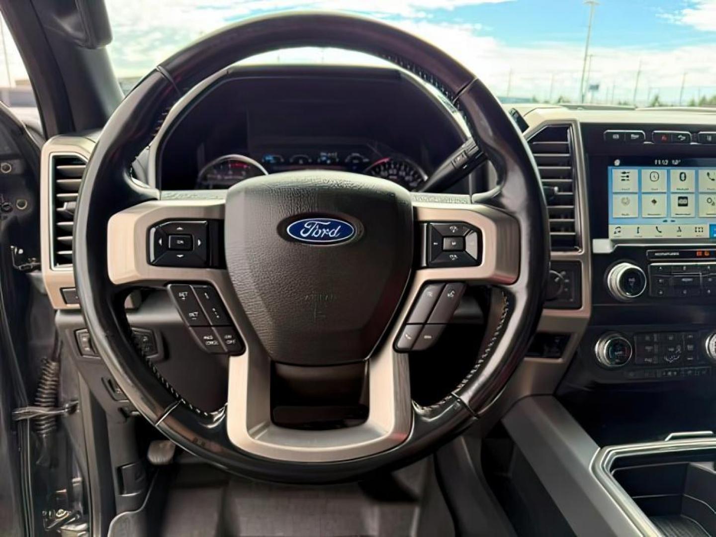 2019 GRAY /Black Ford F-350 Platinum (1FT8W3BT6KE) with an Powerstroke 6.7L V-8 diesel direct injection engine, AUTOMATIC transmission, located at 1235 N Woodruff Ave., Idaho Falls, 83401, (208) 523-1053, 43.507172, -112.000488 - At Timberline Auto, finding a great deal on your next vehicle is always easy! Our experienced sales staff's goal is to help find you the right vehicle at the right price! Our knowledgeable finance department has options for almost any credit score. We offer extended service contract options to prote - Photo#14