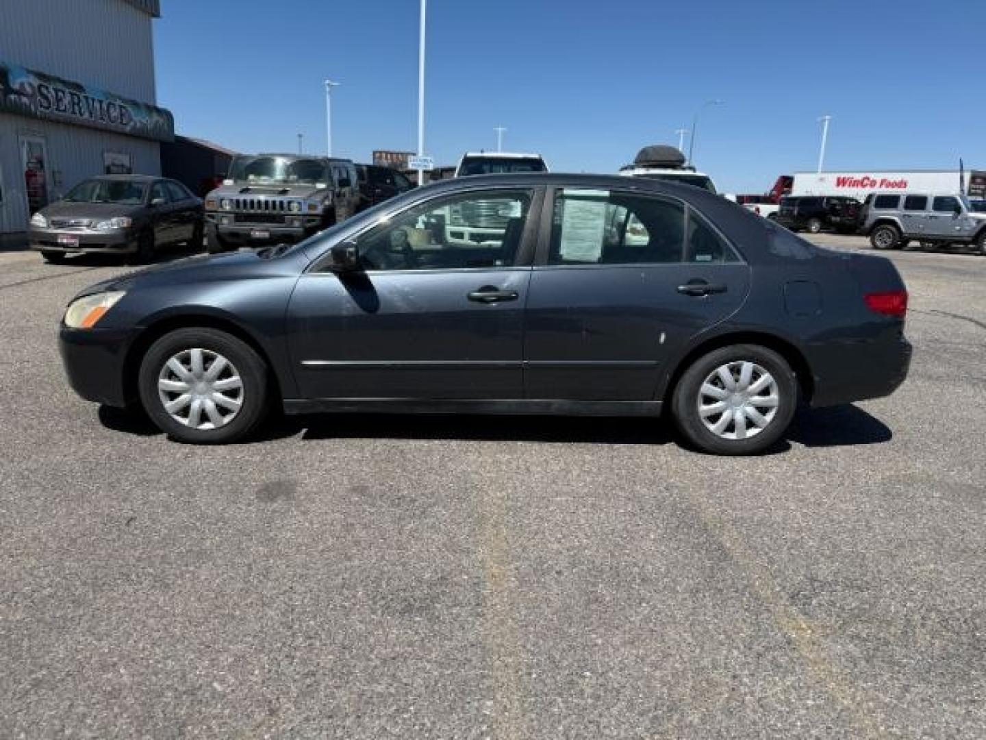 2005 GRAY /Black Cloth Interior Honda Accord (JHMCM56405C) with an 24L L4 DOHC 16V engine, Automatic transmission, located at 1175 N Woodruff Ave, Idaho Falls, ID, 83401, 43.506901, -111.999657 - At Timberline Auto, finding a great deal on your next vehicle is always easy! Our experienced sales staff's goal is to help find you the right vehicle at the right price! Our knowledgeable finance department has options for almost any credit score. We offer extended service contract options to prote - Photo#21