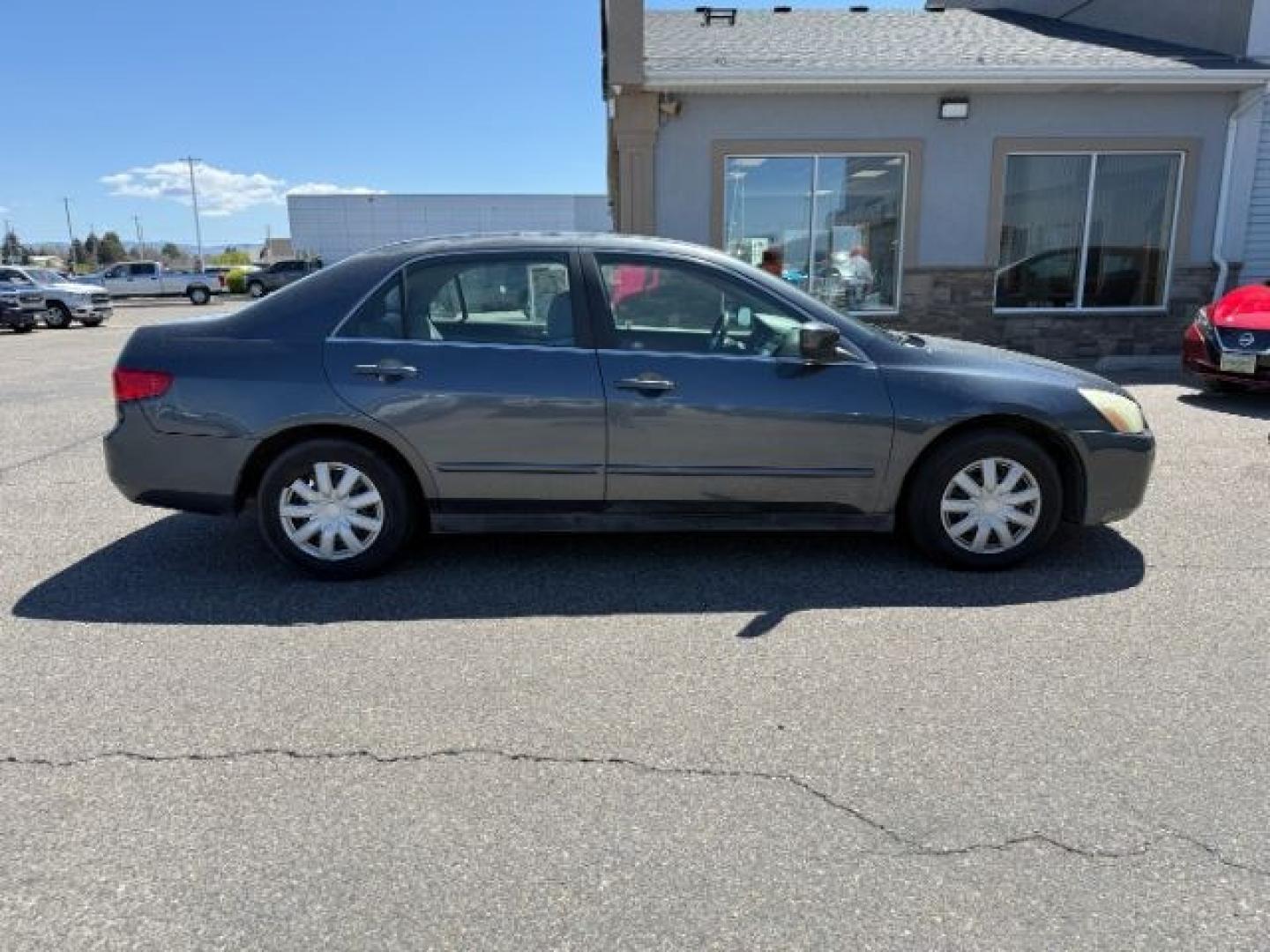 2005 GRAY /Black Cloth Interior Honda Accord (JHMCM56405C) with an 24L L4 DOHC 16V engine, Automatic transmission, located at 1175 N Woodruff Ave, Idaho Falls, ID, 83401, 43.506901, -111.999657 - At Timberline Auto, finding a great deal on your next vehicle is always easy! Our experienced sales staff's goal is to help find you the right vehicle at the right price! Our knowledgeable finance department has options for almost any credit score. We offer extended service contract options to prote - Photo#25
