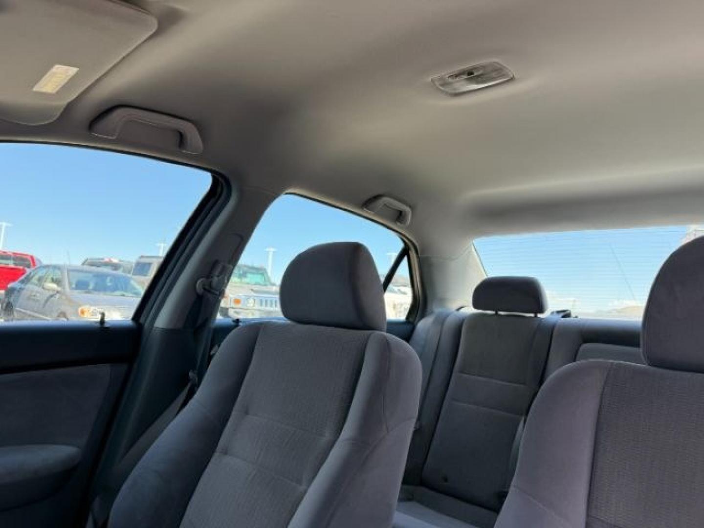 2005 GRAY /Black Cloth Interior Honda Accord (JHMCM56405C) with an 24L L4 DOHC 16V engine, Automatic transmission, located at 1175 N Woodruff Ave, Idaho Falls, ID, 83401, 43.506901, -111.999657 - At Timberline Auto, finding a great deal on your next vehicle is always easy! Our experienced sales staff's goal is to help find you the right vehicle at the right price! Our knowledgeable finance department has options for almost any credit score. We offer extended service contract options to prote - Photo#35