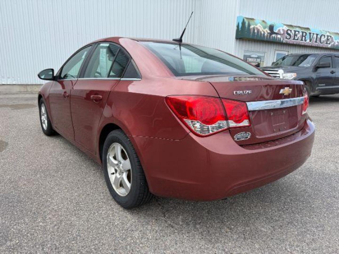 2013 COPPER /Jet Black Chevrolet Cruze 1LT Auto (1G1PC5SB6D7) with an ECOTEC 1.4L I-4 DOHC engine, AUTOMATIC transmission, located at 1235 N Woodruff Ave., Idaho Falls, 83401, (208) 523-1053, 43.507172, -112.000488 - At Timberline Auto, finding a great deal on your next vehicle is always easy! Our experienced sales staff's goal is to help find you the right vehicle at the right price! Our knowledgeable finance department has options for almost any credit score. We offer extended service contract options to prote - Photo#2