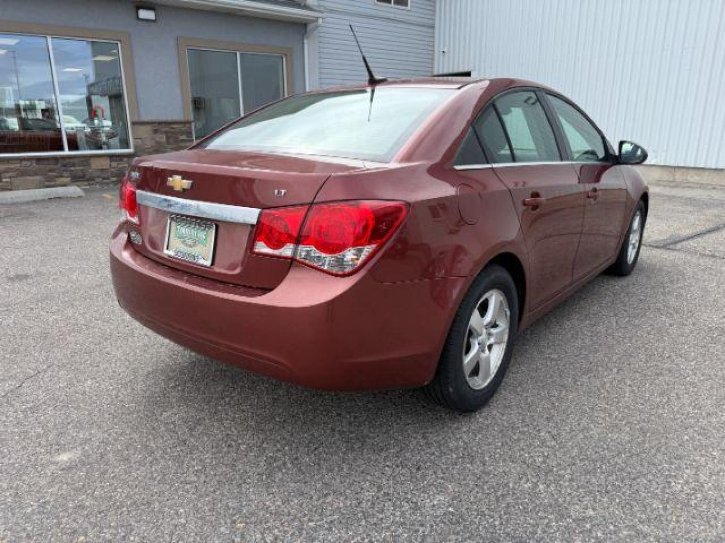 2013 COPPER /Jet Black Chevrolet Cruze 1LT Auto (1G1PC5SB6D7) with an ECOTEC 1.4L I-4 DOHC engine, AUTOMATIC transmission, located at 1235 N Woodruff Ave., Idaho Falls, 83401, (208) 523-1053, 43.507172, -112.000488 - At Timberline Auto, finding a great deal on your next vehicle is always easy! Our experienced sales staff's goal is to help find you the right vehicle at the right price! Our knowledgeable finance department has options for almost any credit score. We offer extended service contract options to prote - Photo#4